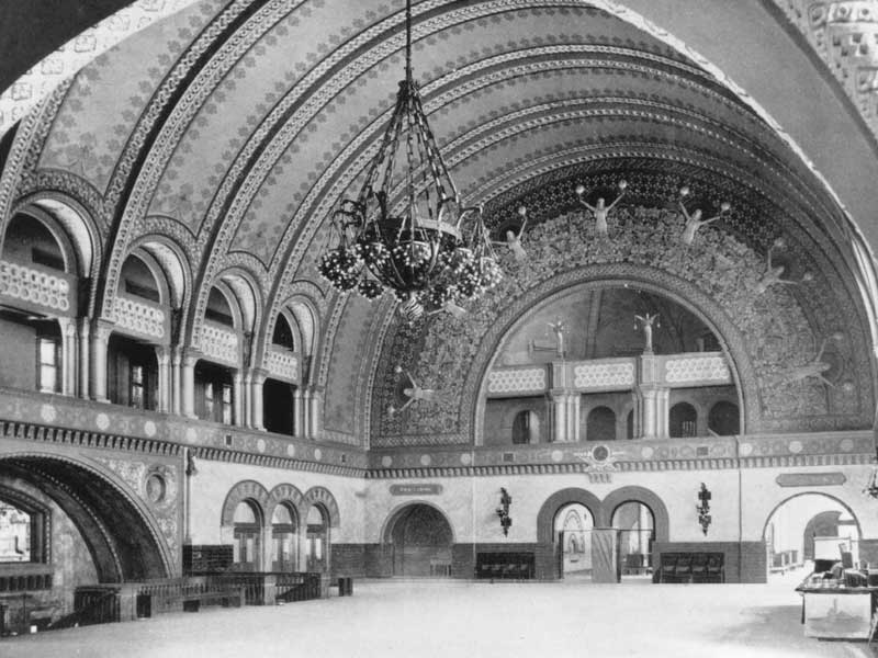 a large ornate building with a chandelier