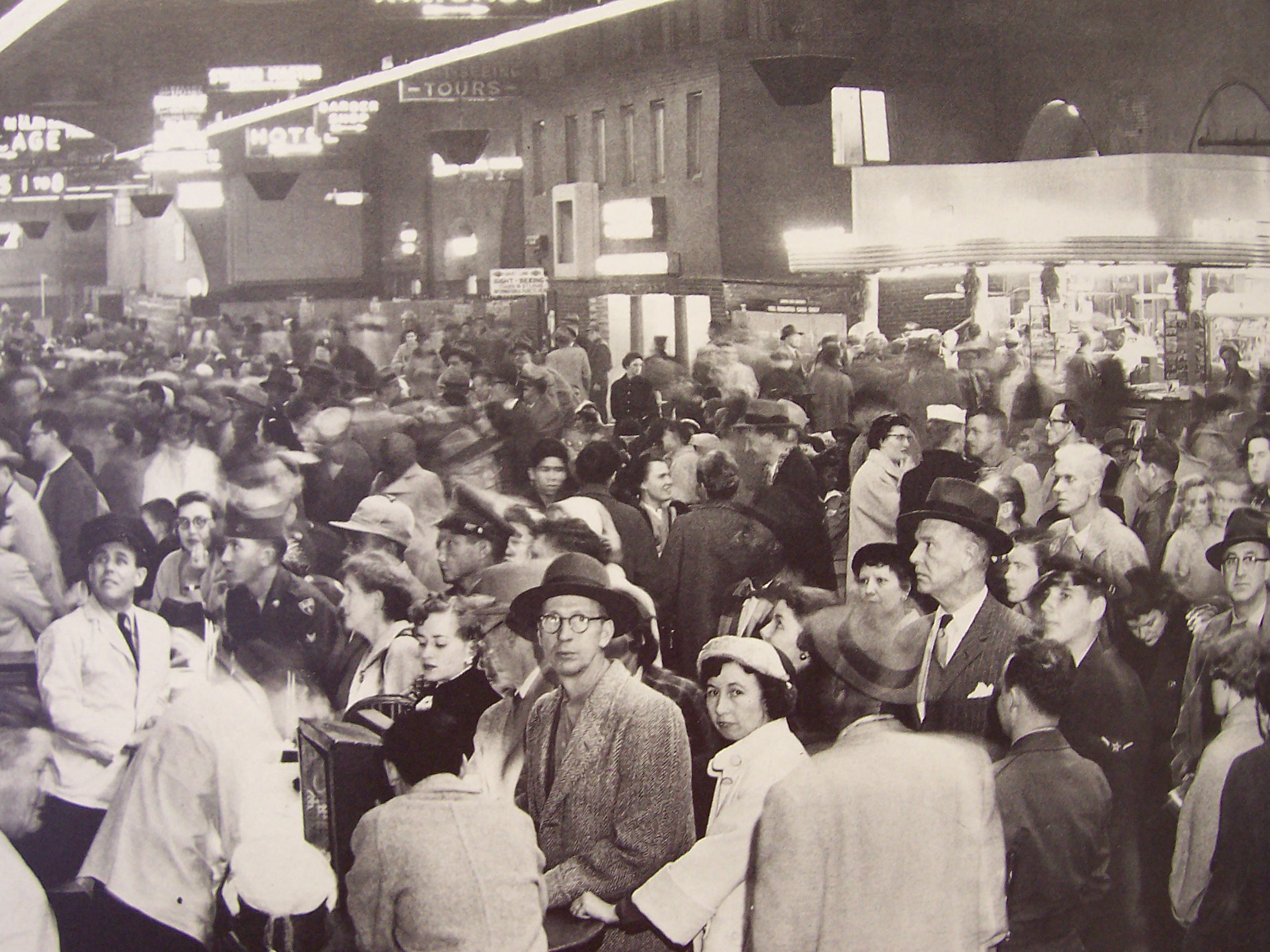 a crowd of people in a crowded area