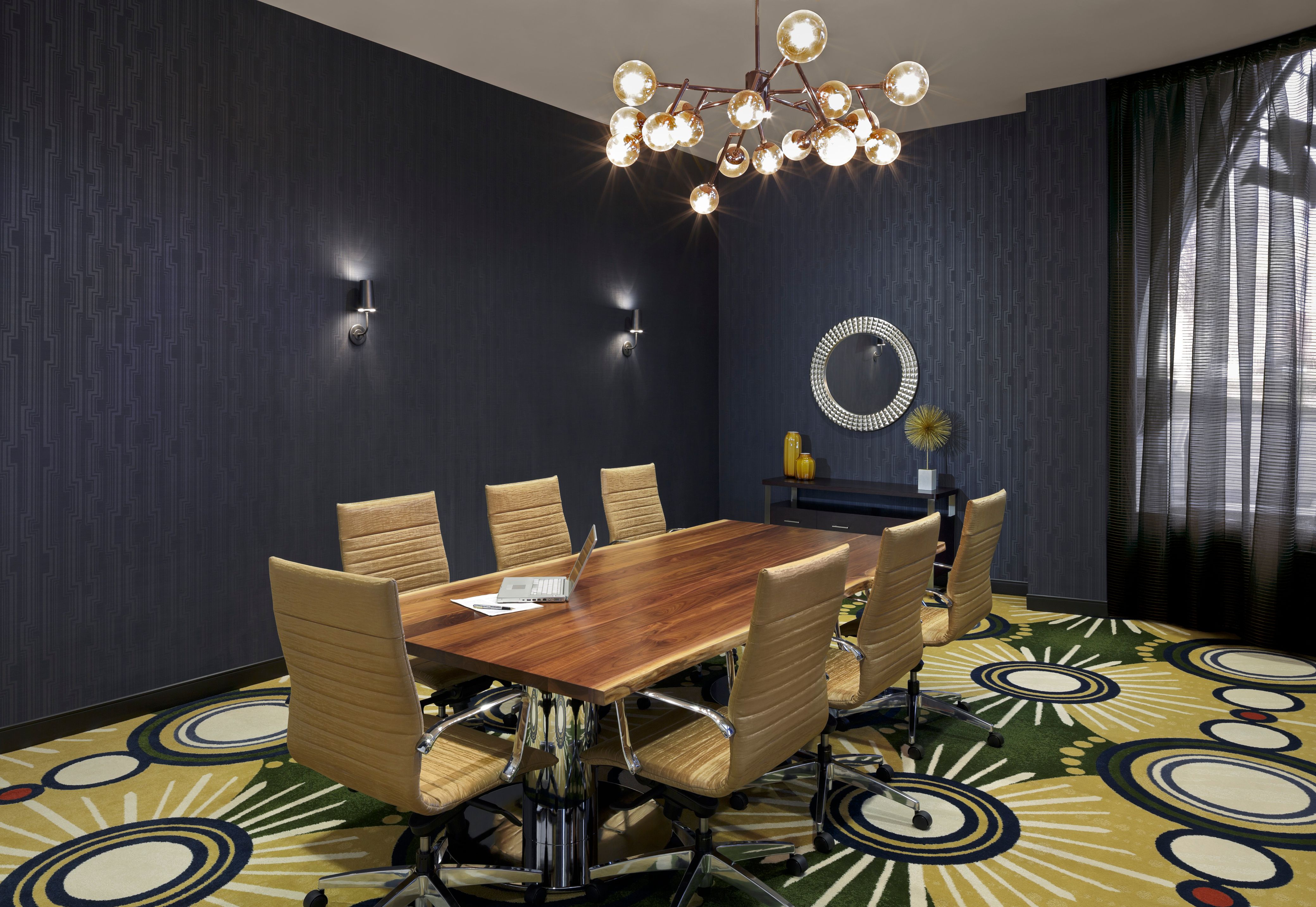 a room with a table and chairs