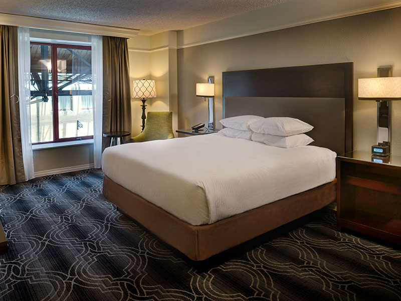 a bed in a hotel room