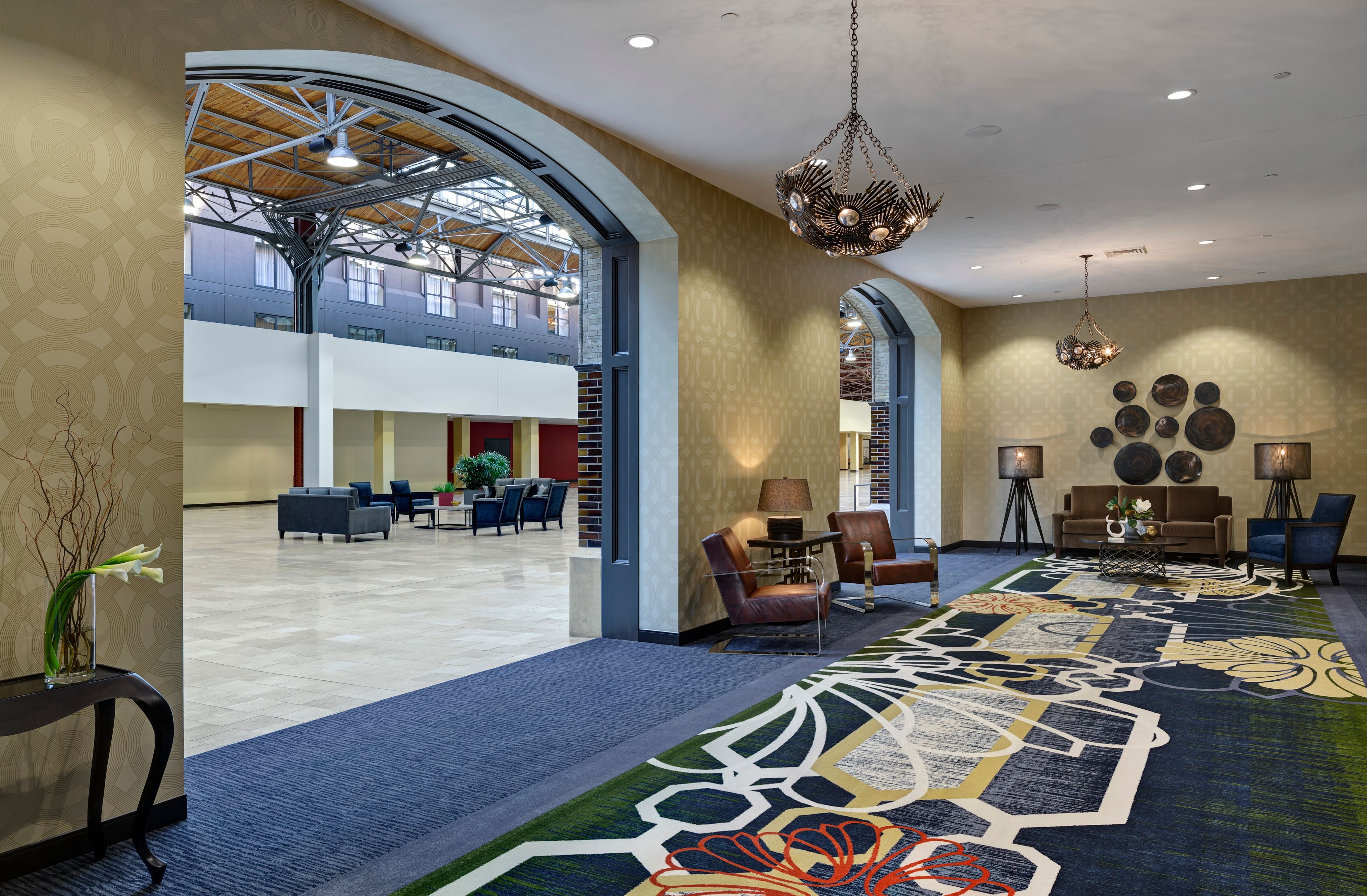 a large room with a large archway and a large window