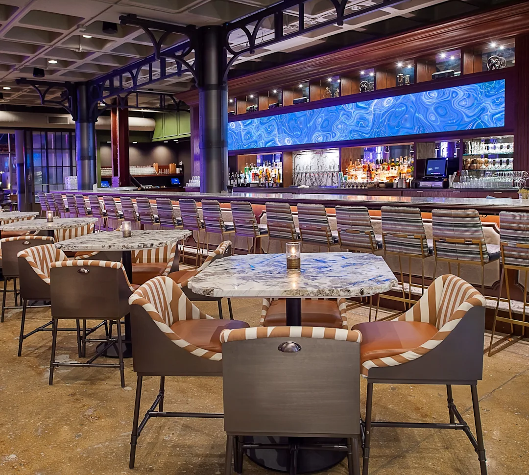 a restaurant with tables and chairs