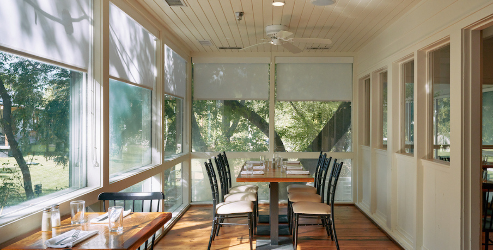a room with a table and chairs