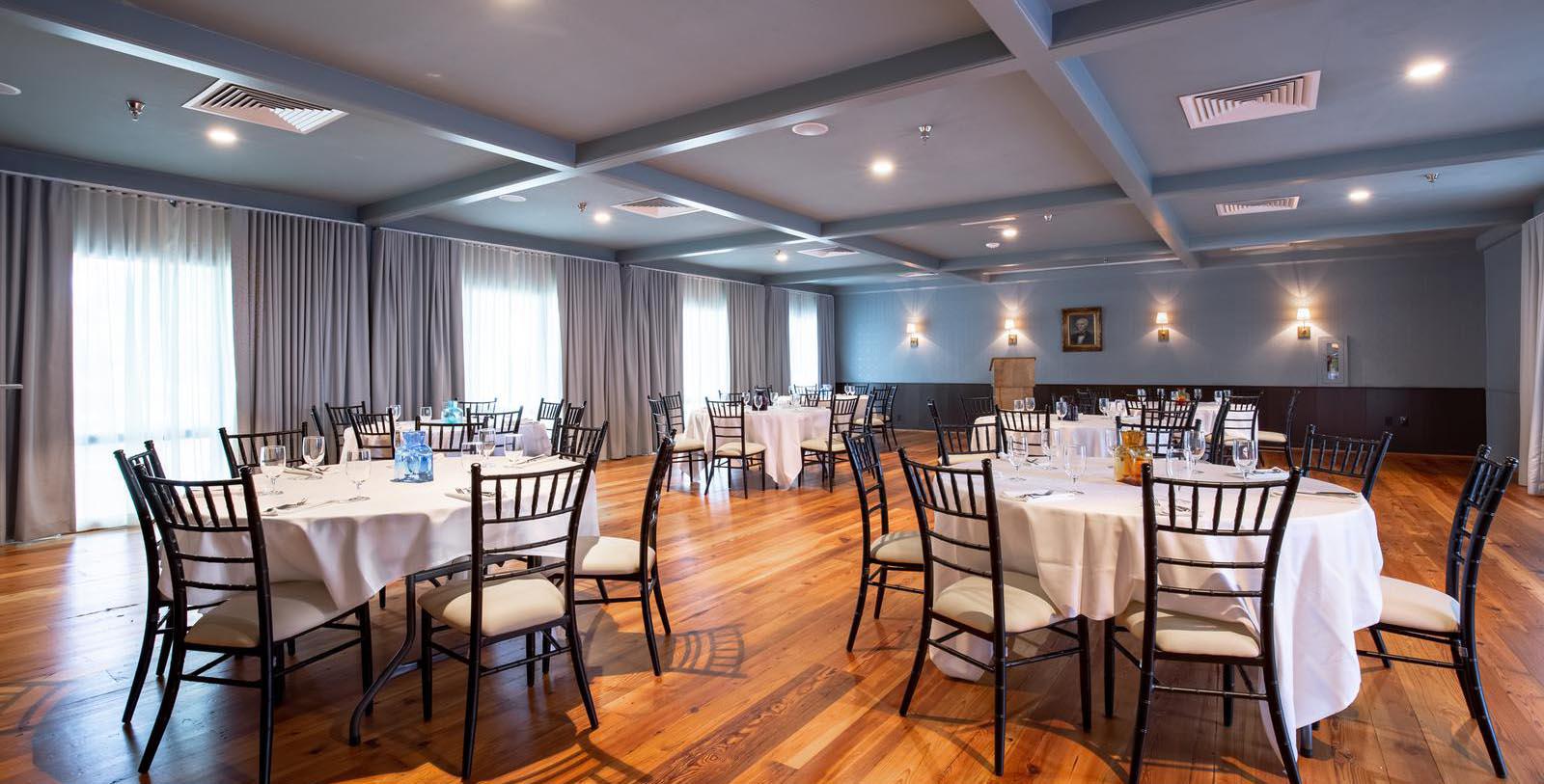 a room with tables and chairs
