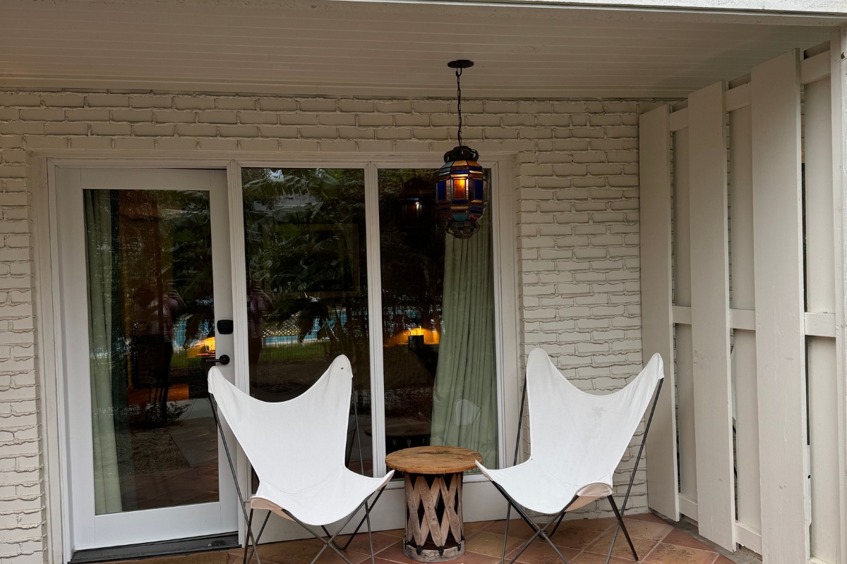 chairs on a patio with a table