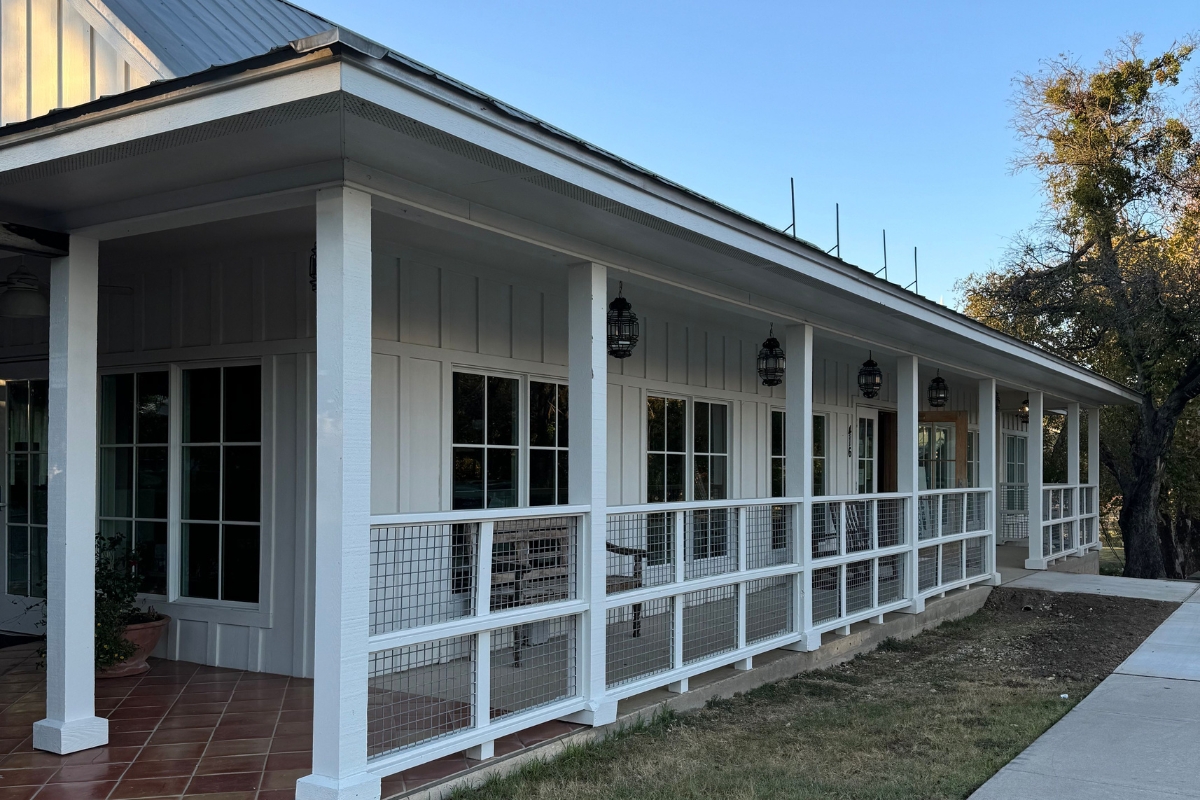 a white building with a fence