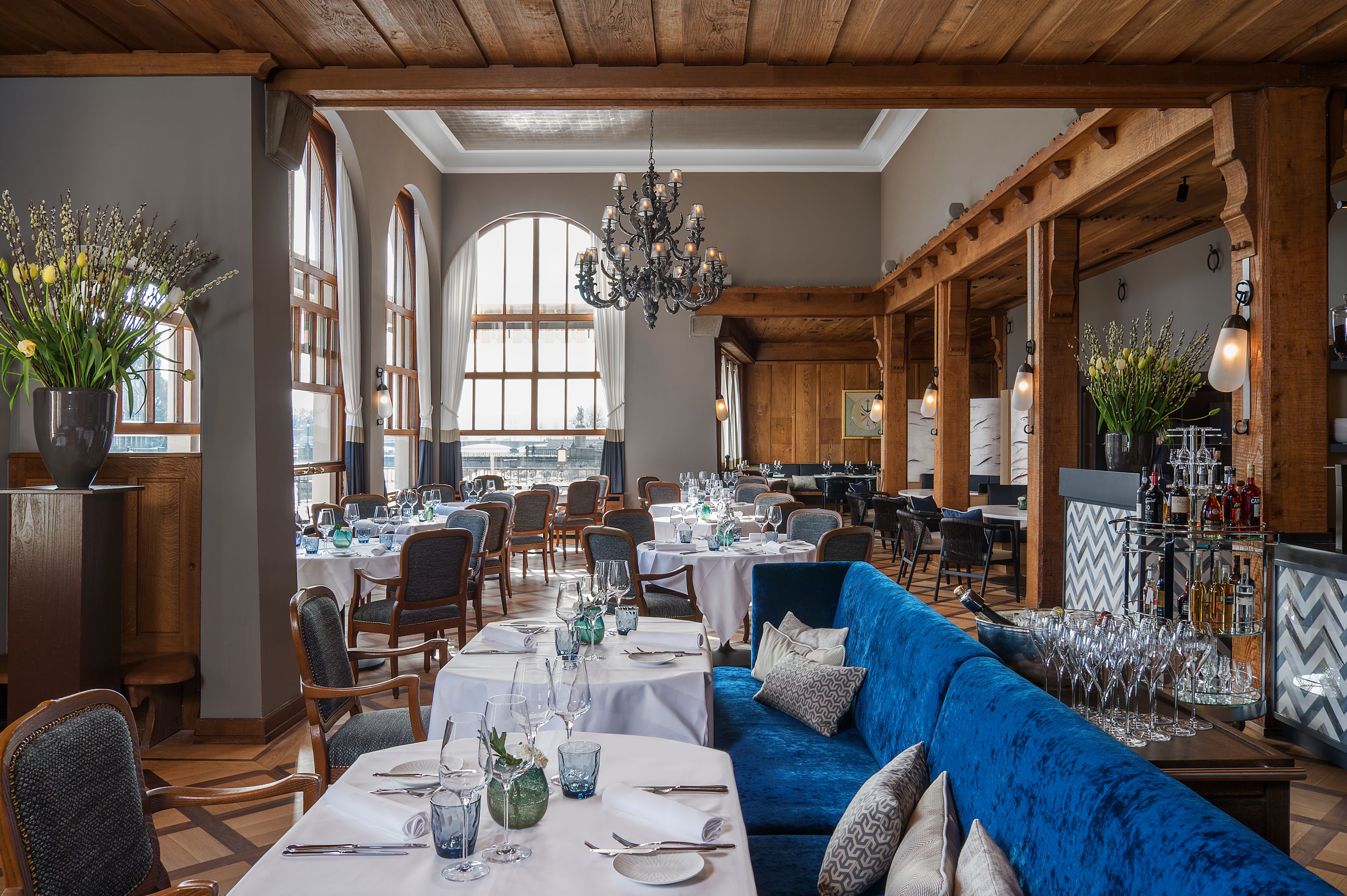 a restaurant with tables and chairs