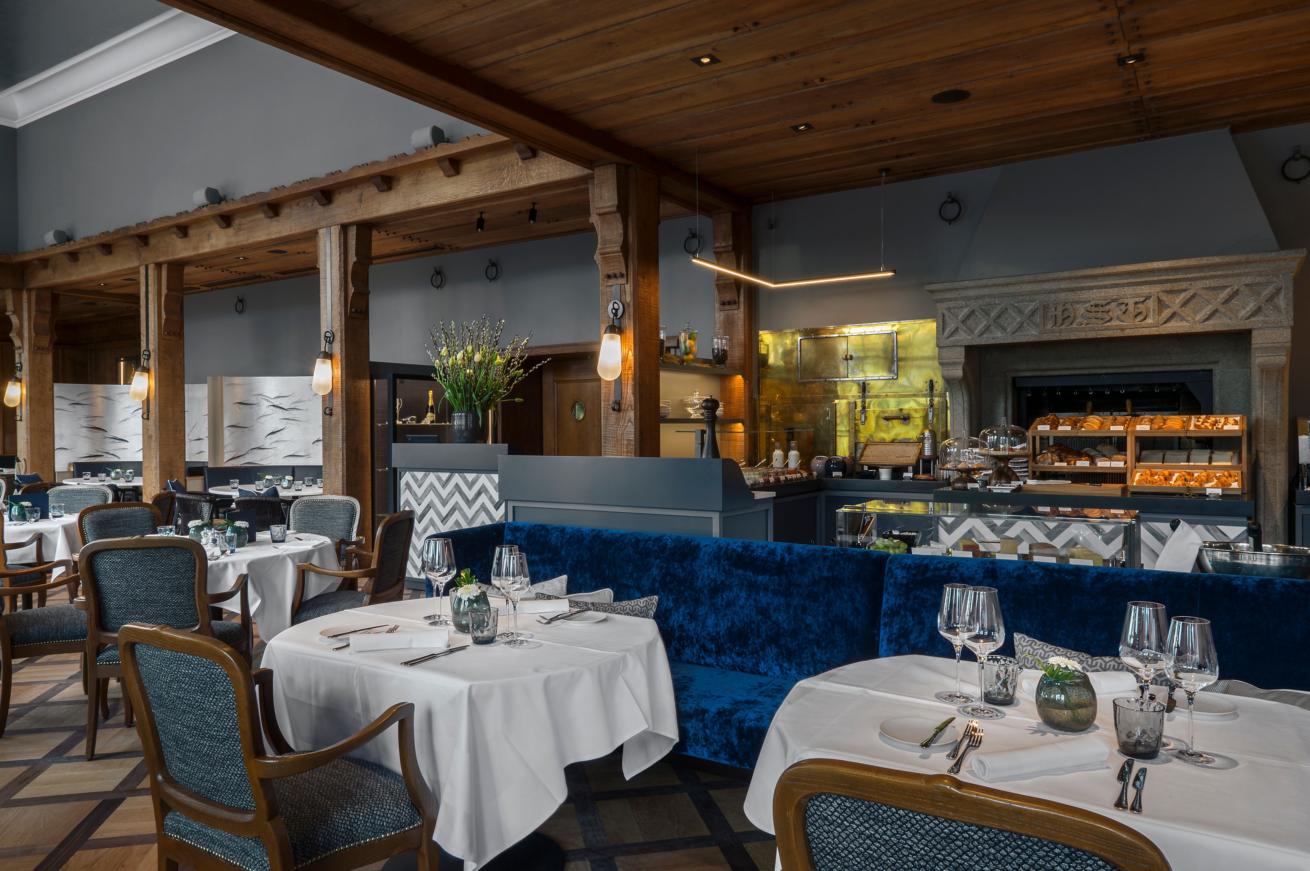 a restaurant with tables and chairs