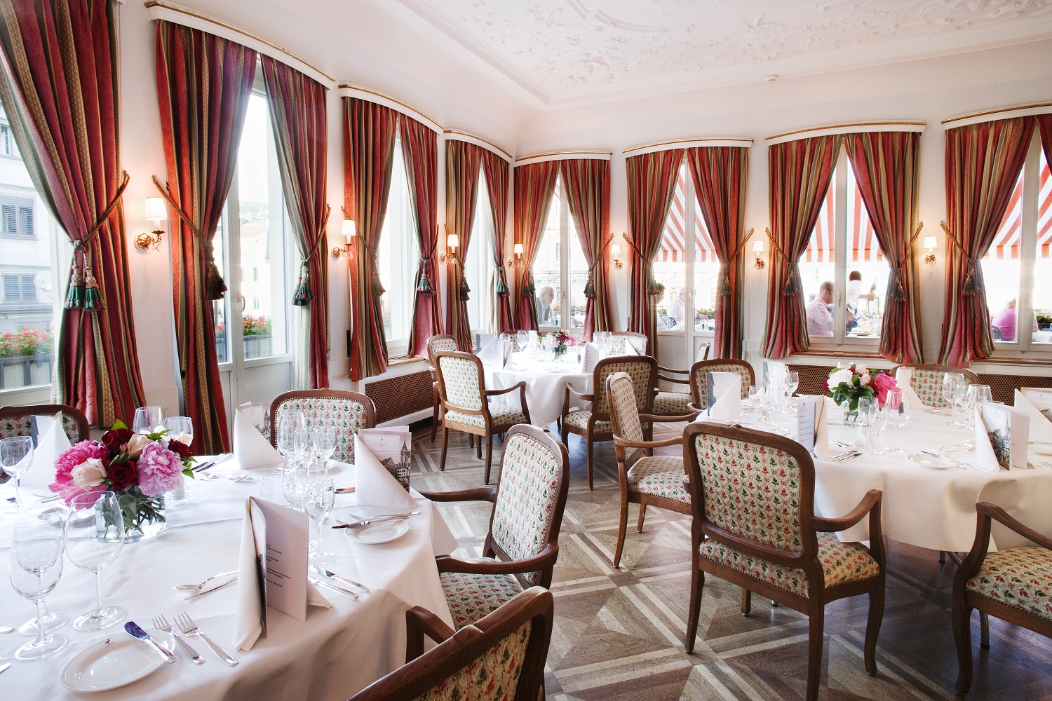a room with tables and chairs