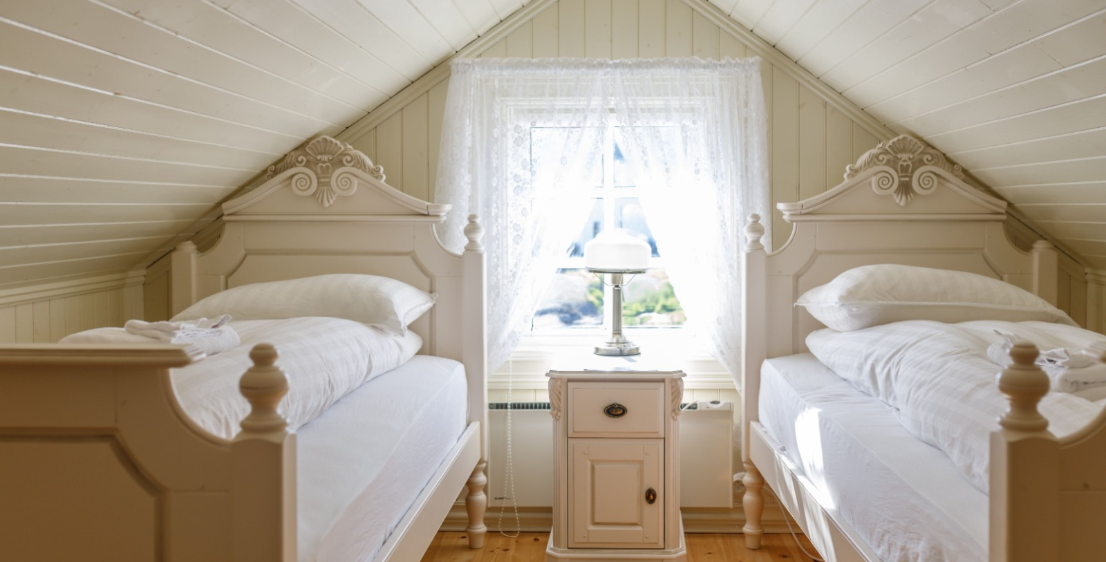 a bedroom with two beds