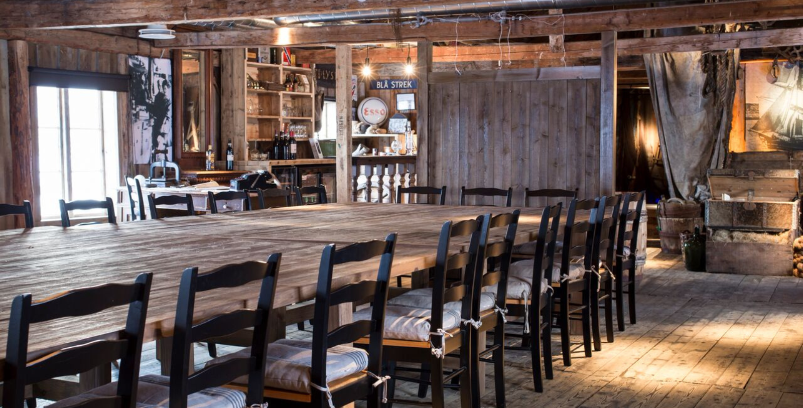 a large table with chairs in a room