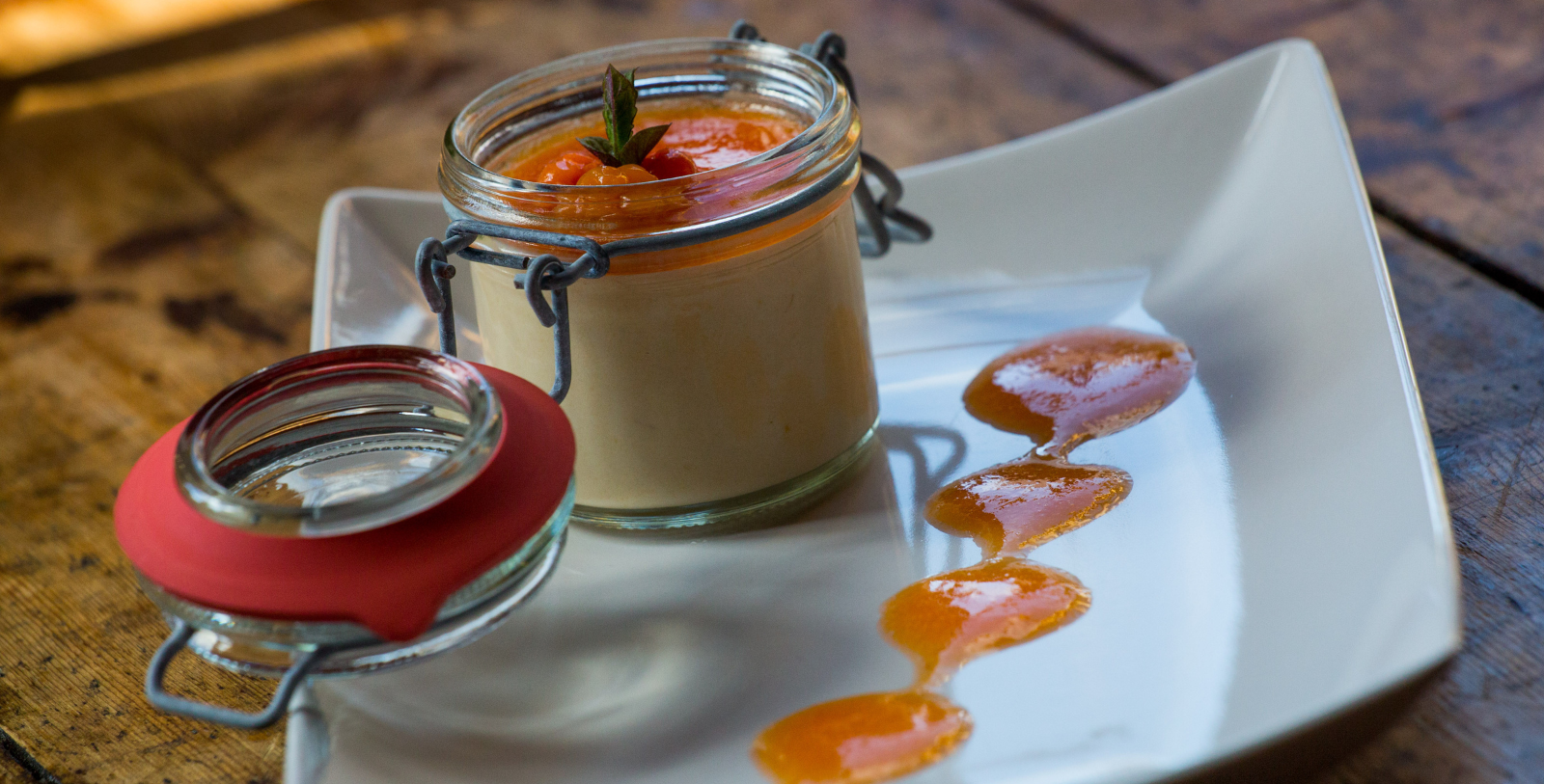 a jar of food on a plate