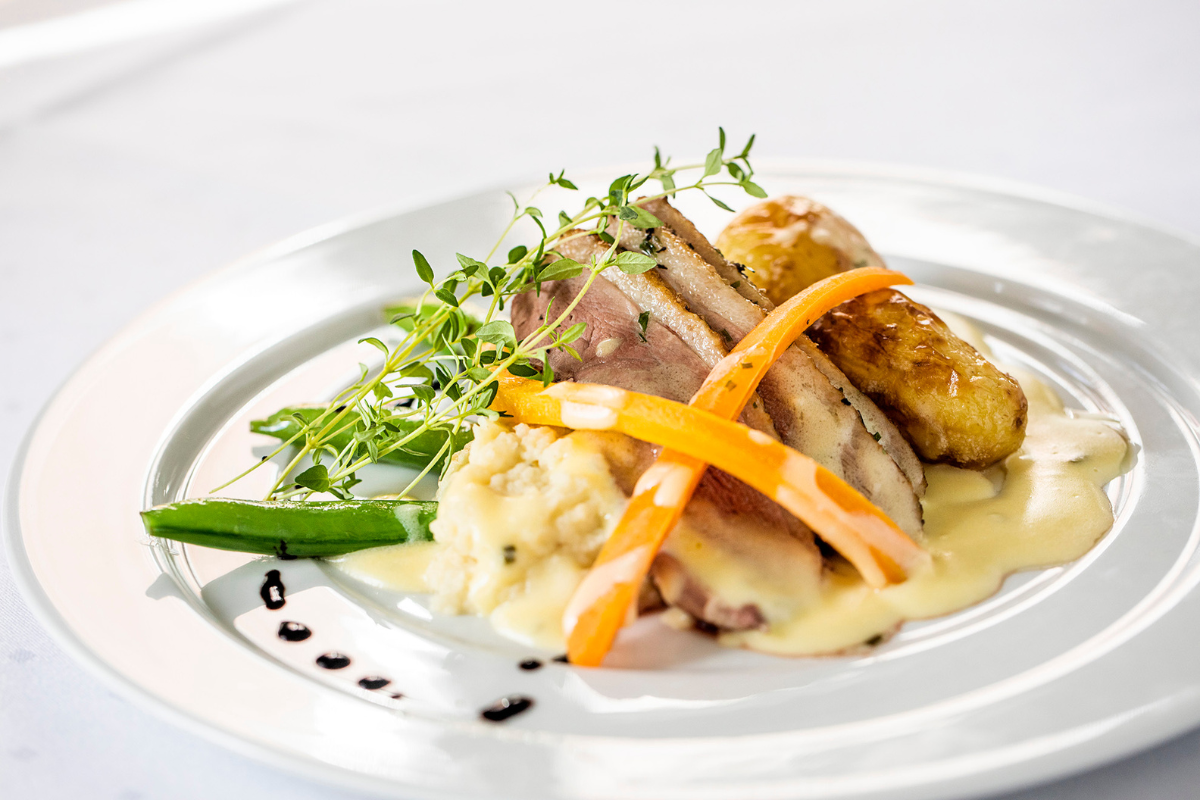a plate of food on a white surface