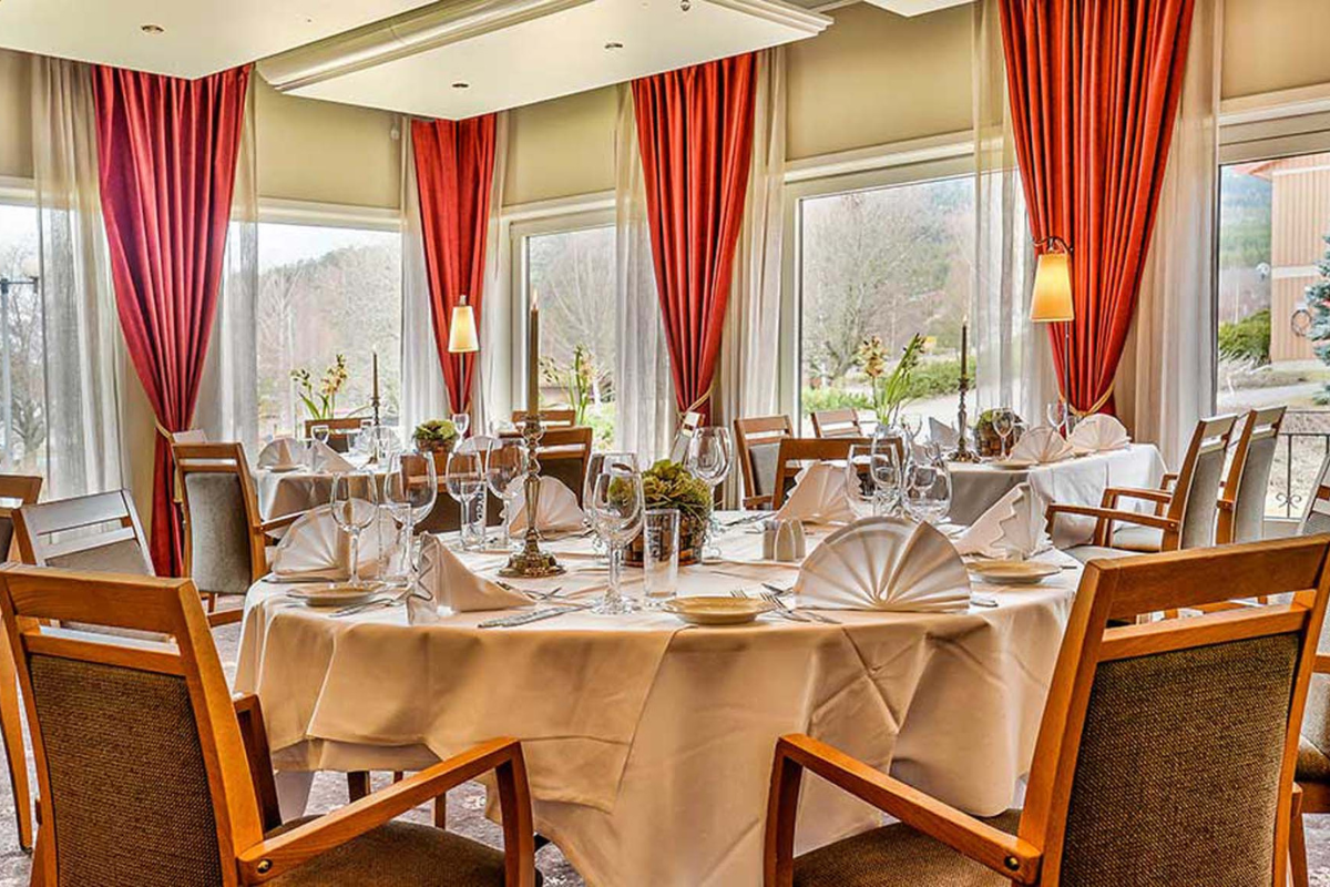 a room with tables and chairs