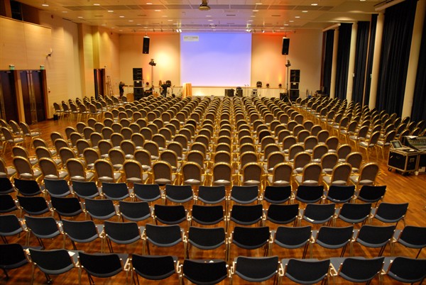 a large room with rows of chairs