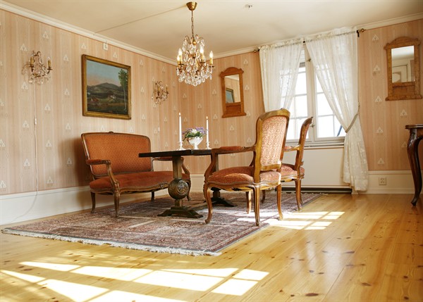 a room with a table and chairs