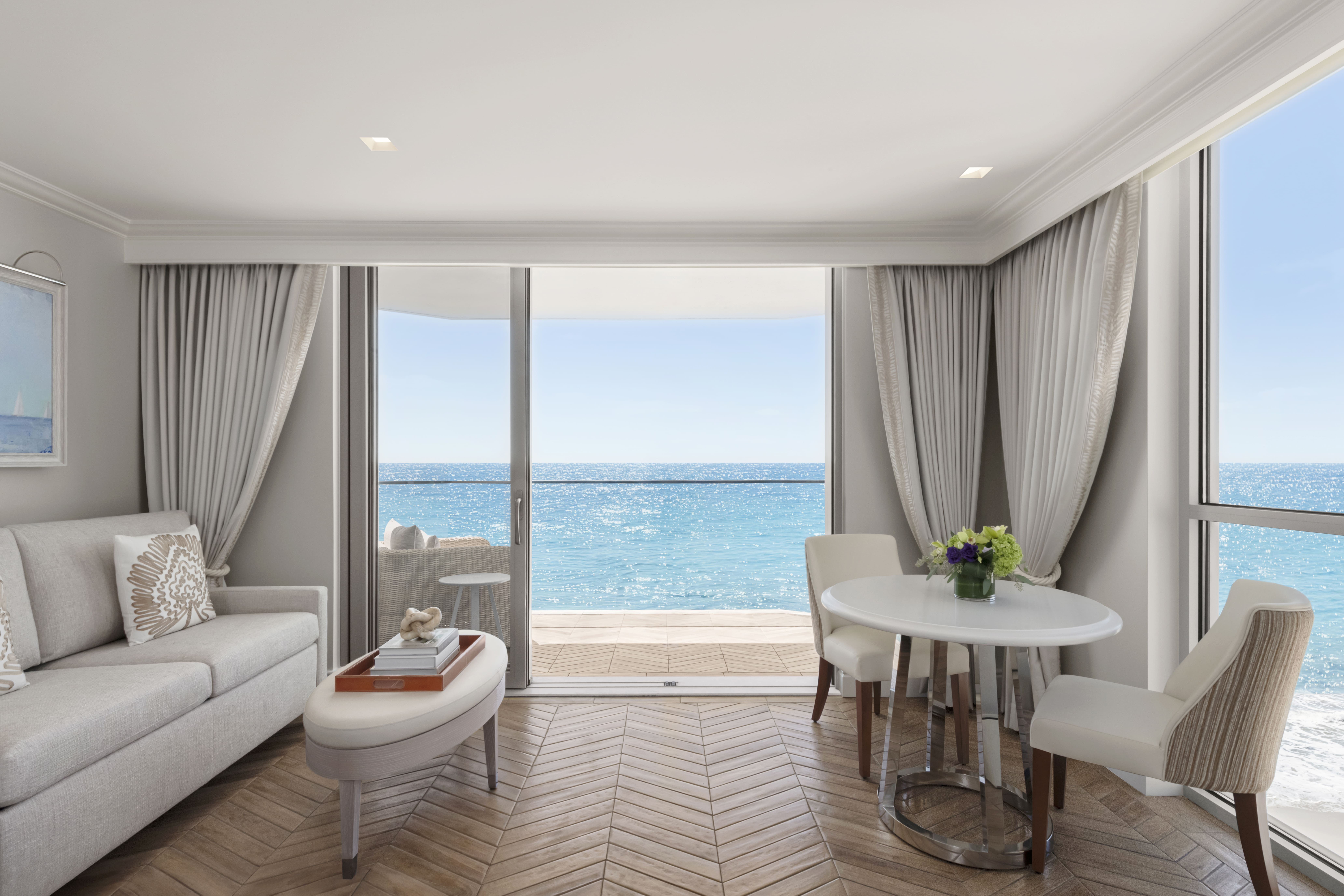 a room with a view of the ocean