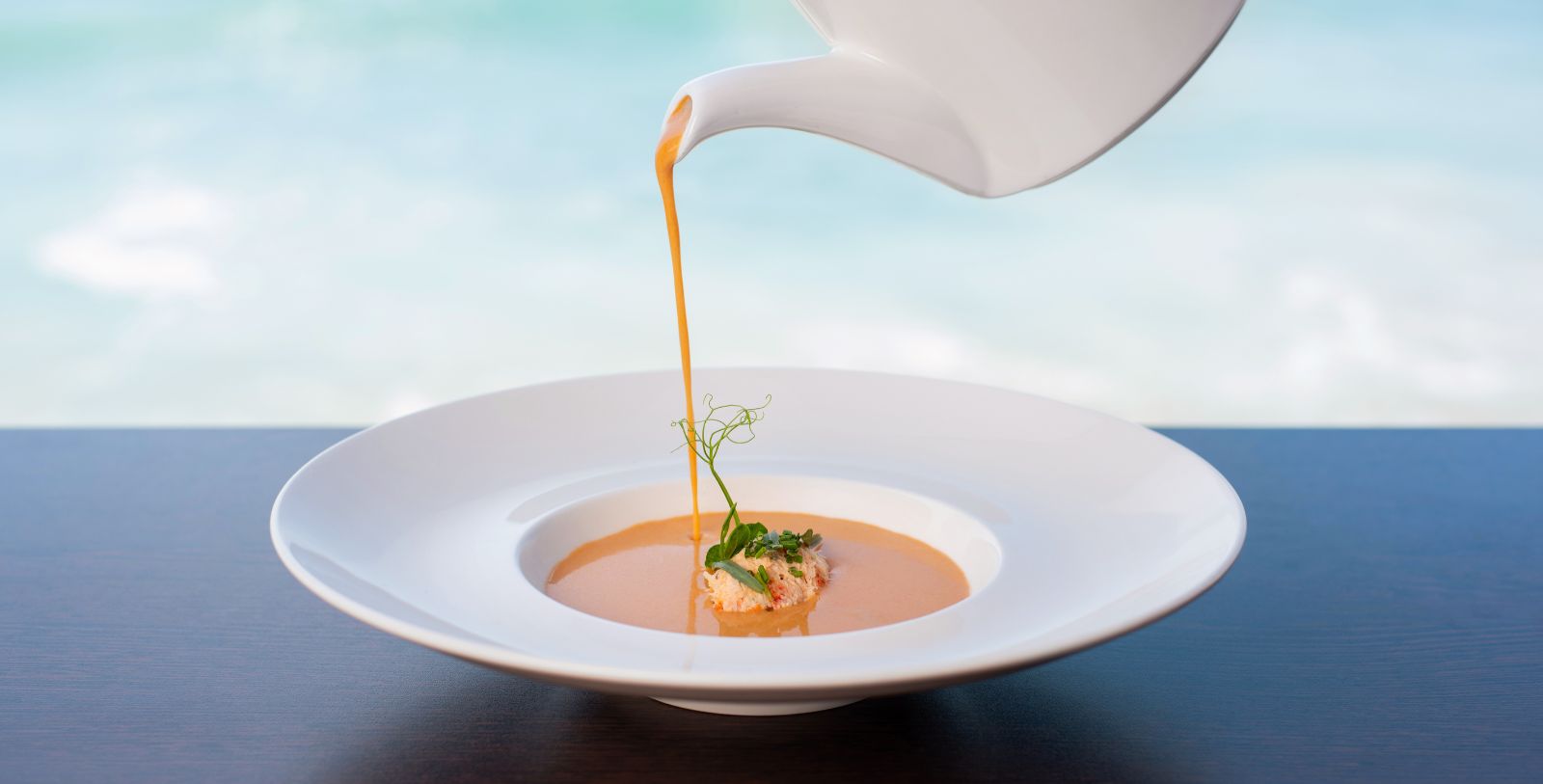 a soup in a white bowl