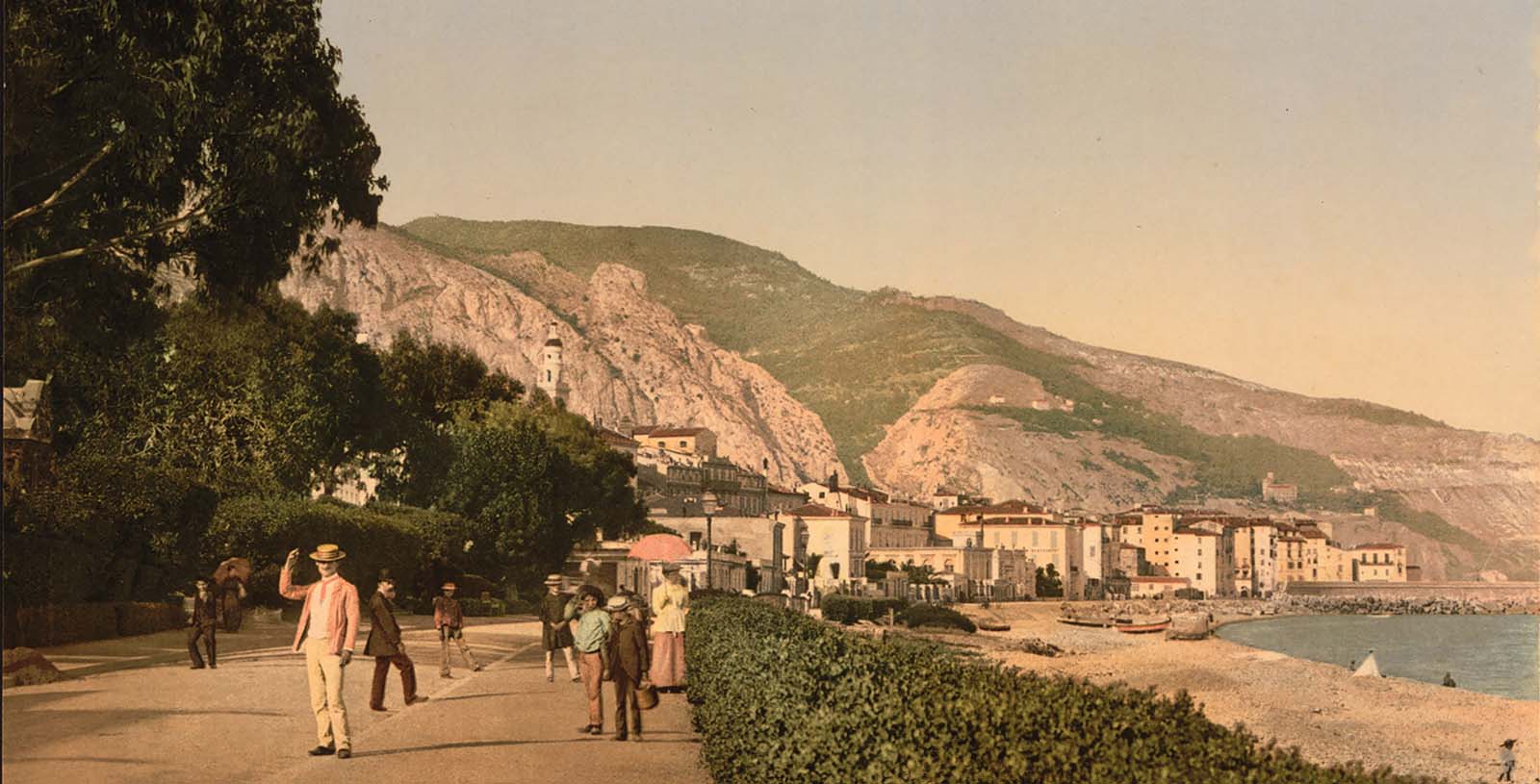 a group of people walking on a street