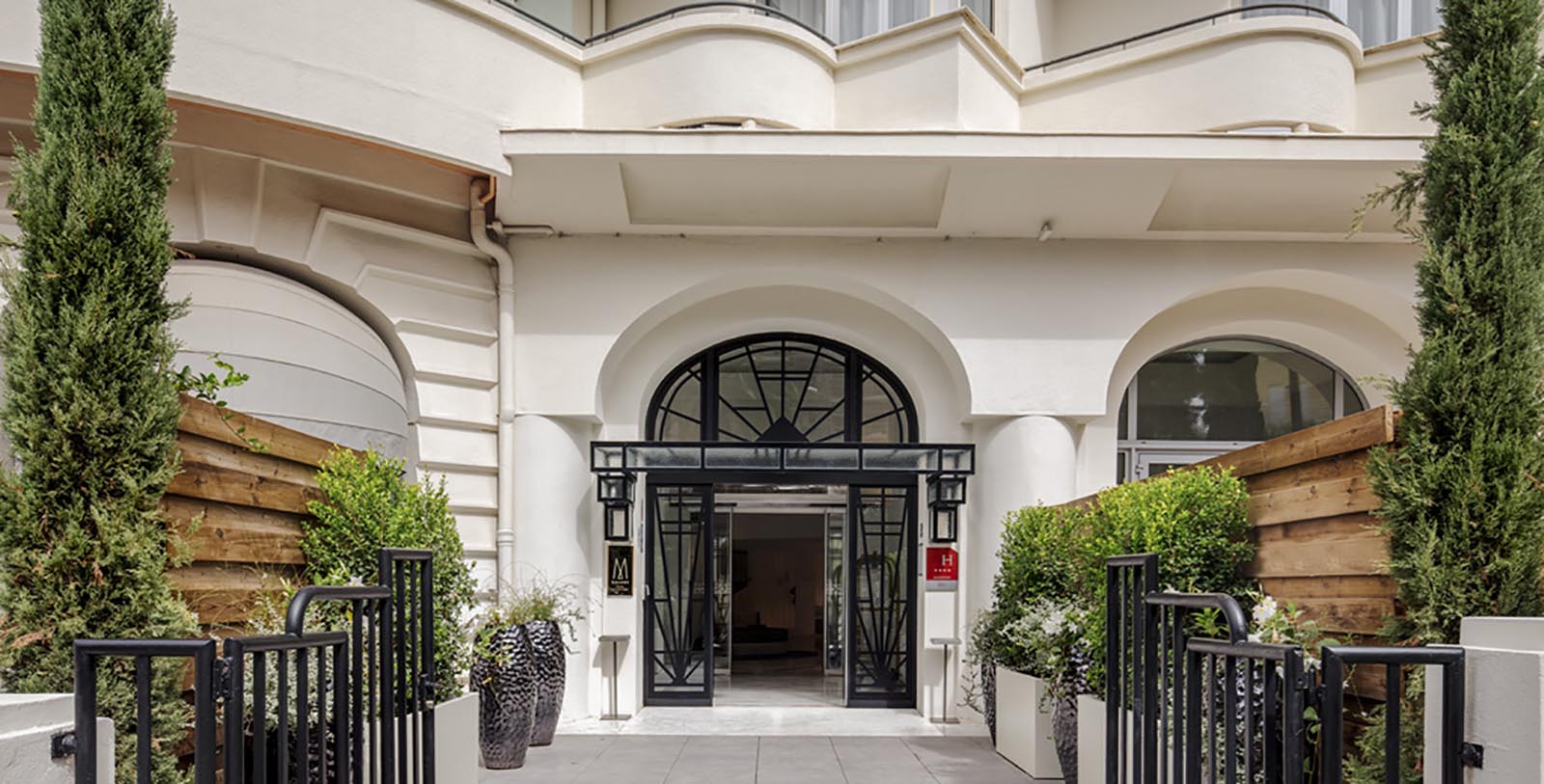 a building with a door and a gate