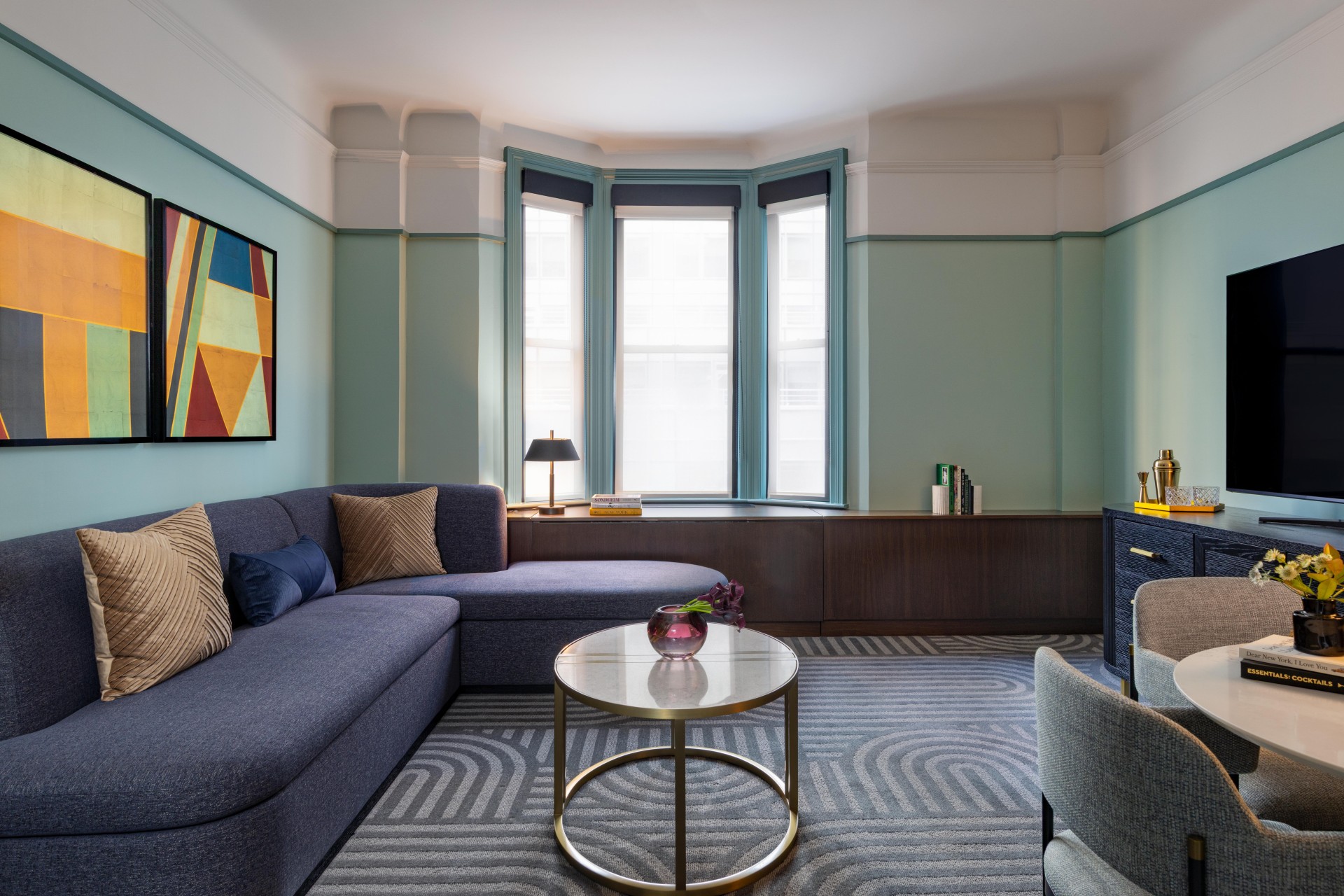 a living room with a couch and a table