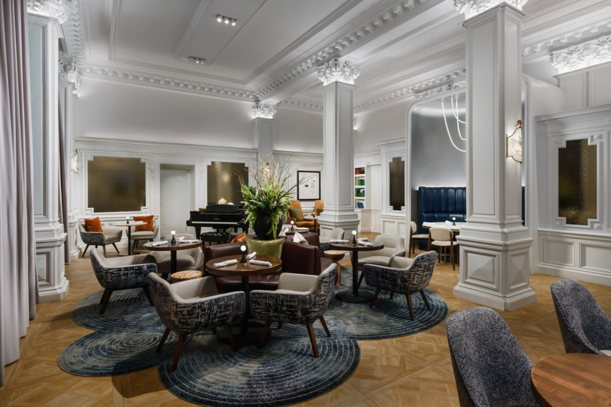 a room with tables and chairs
