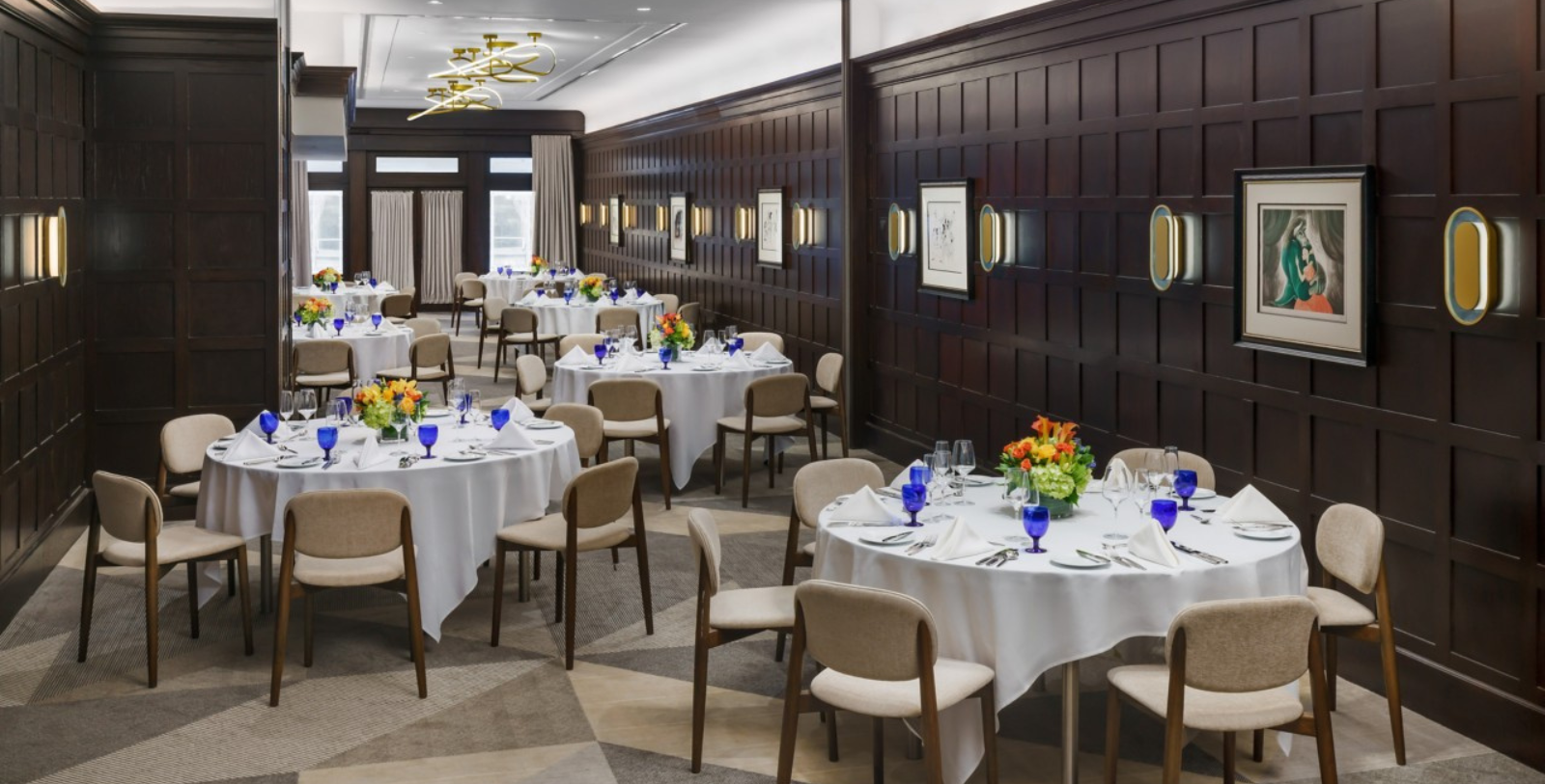 a room with tables and chairs