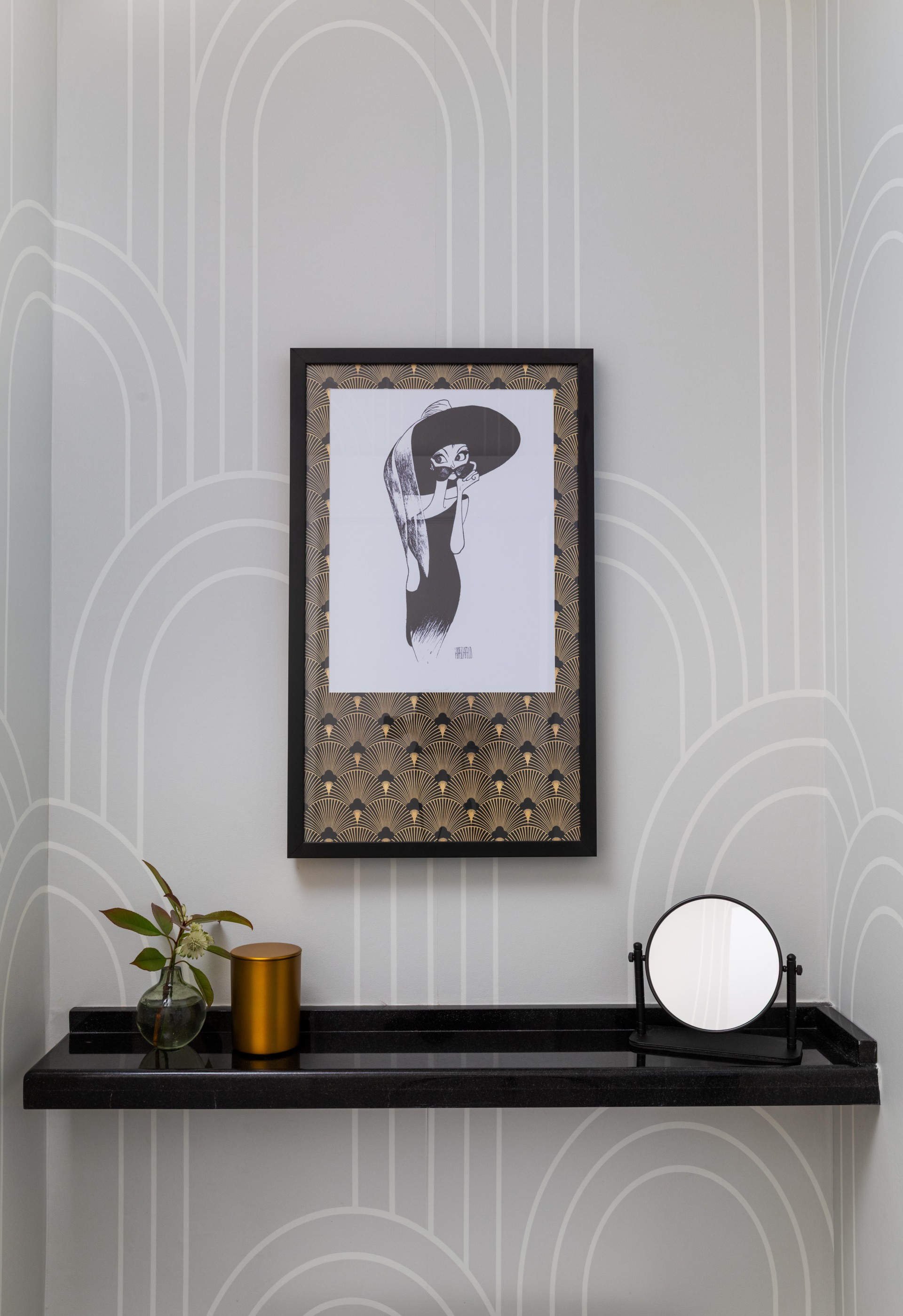 a framed picture on a wall