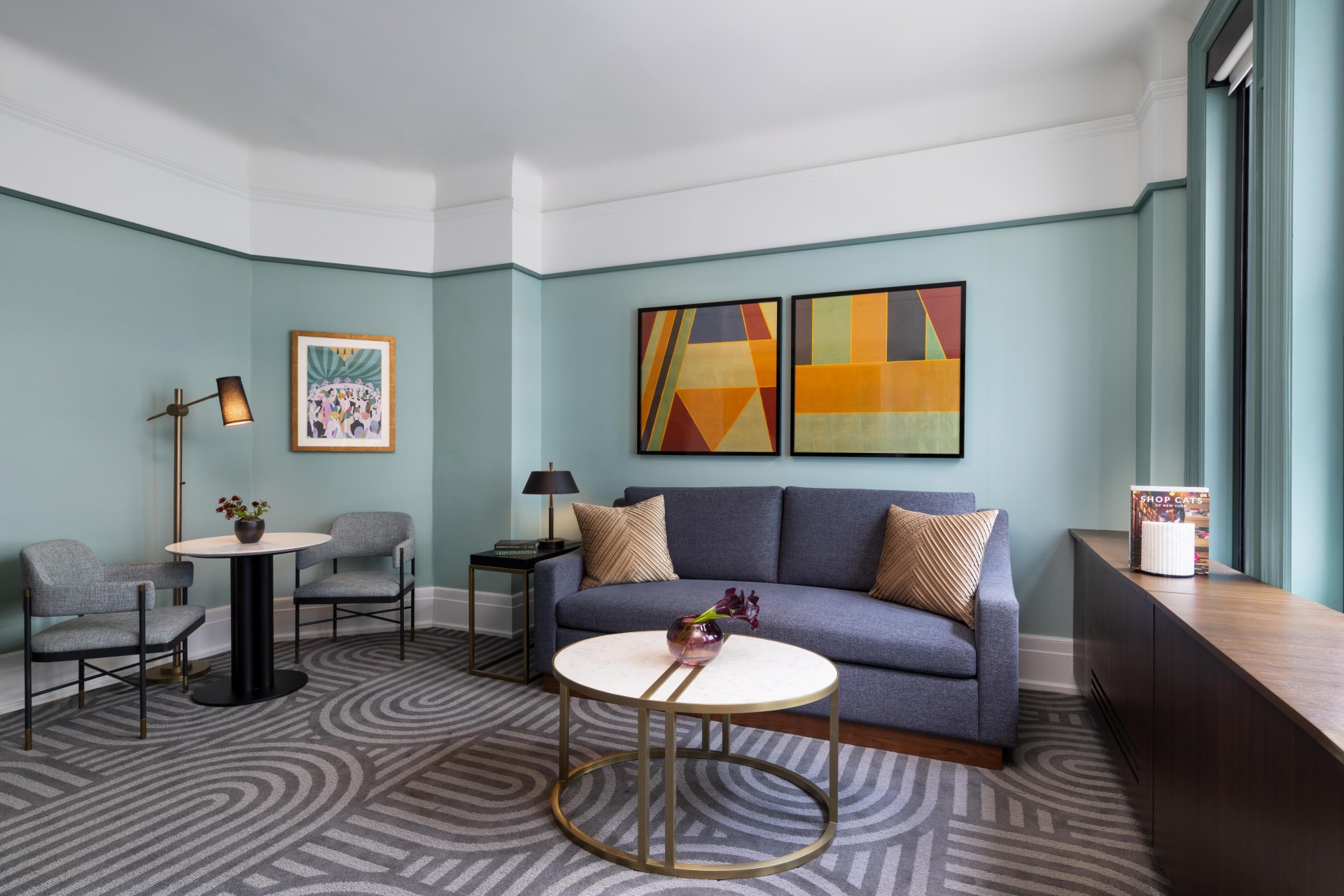a living room with a couch and a table