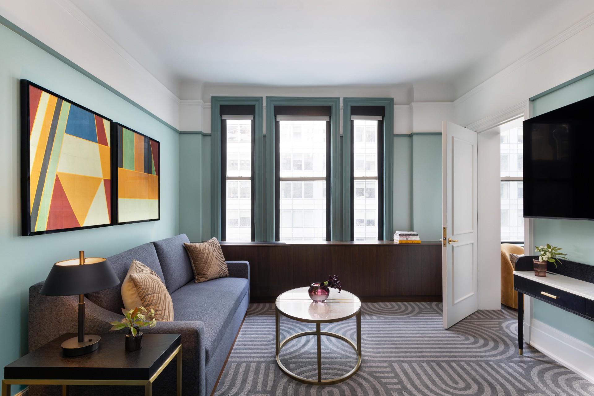 a room with a couch and a coffee table