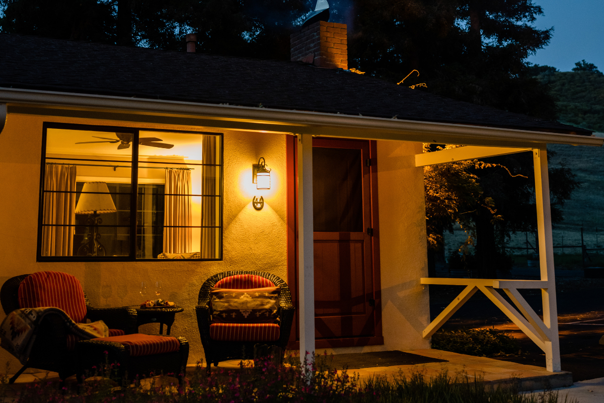 a house with a porch and chairs