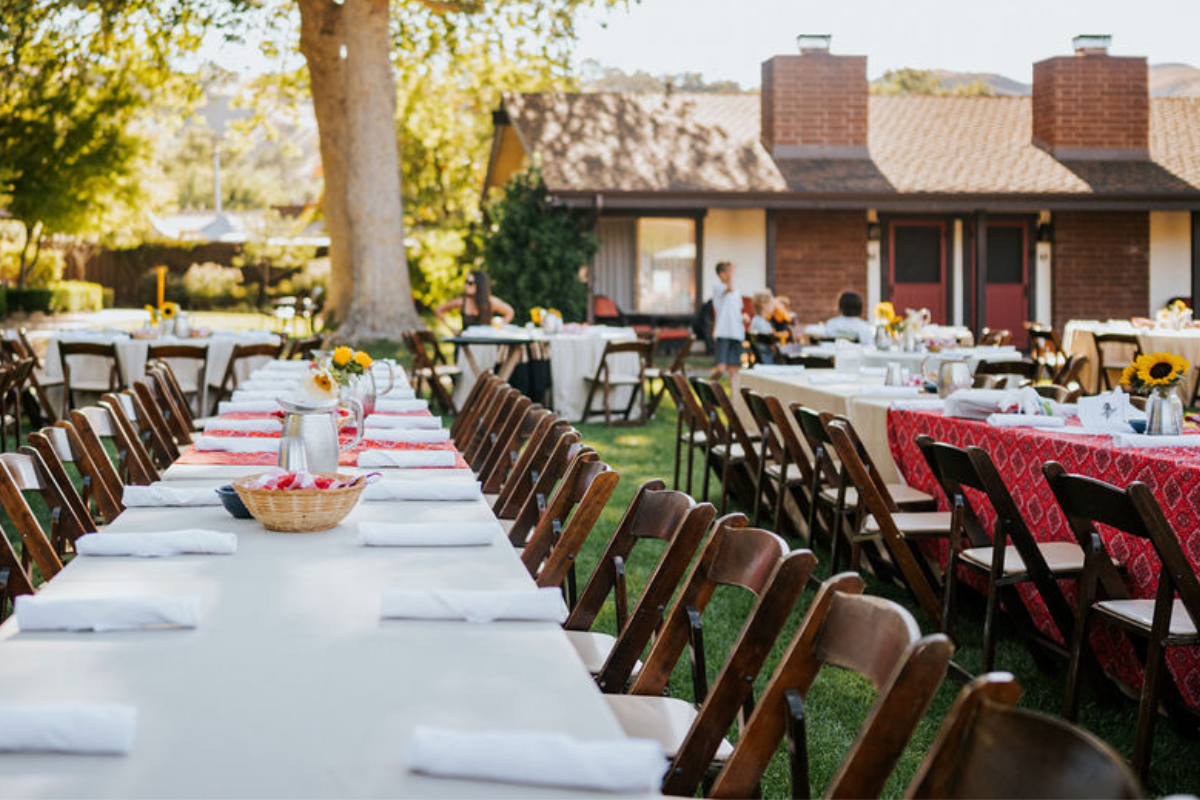 a long table set up for a party