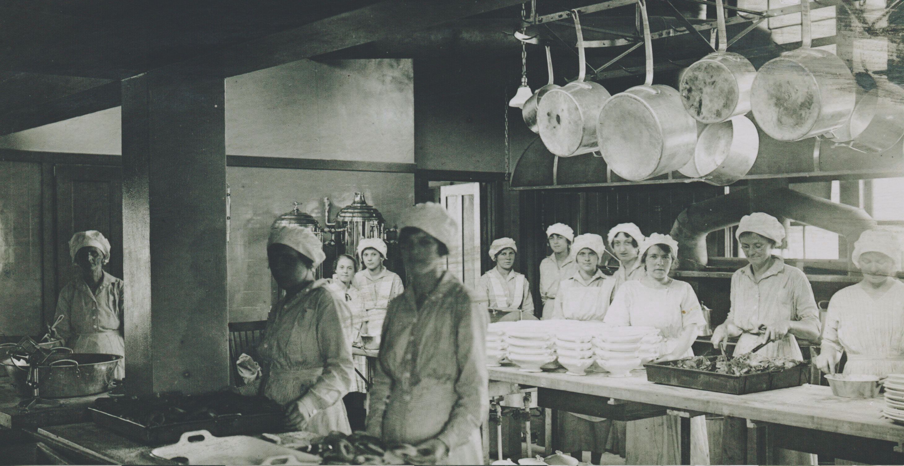 a group of women in a kitchen