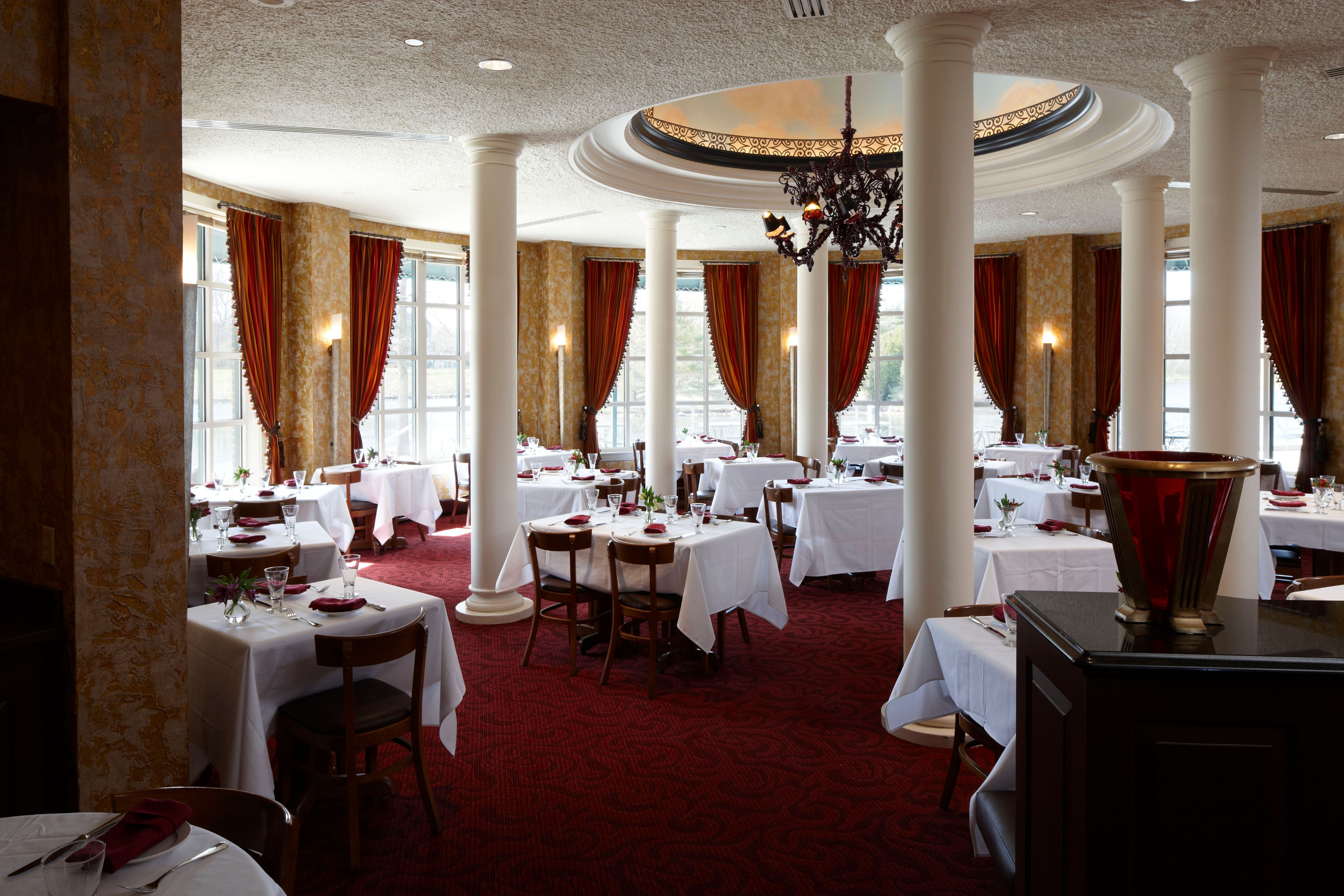 a room with tables and chairs