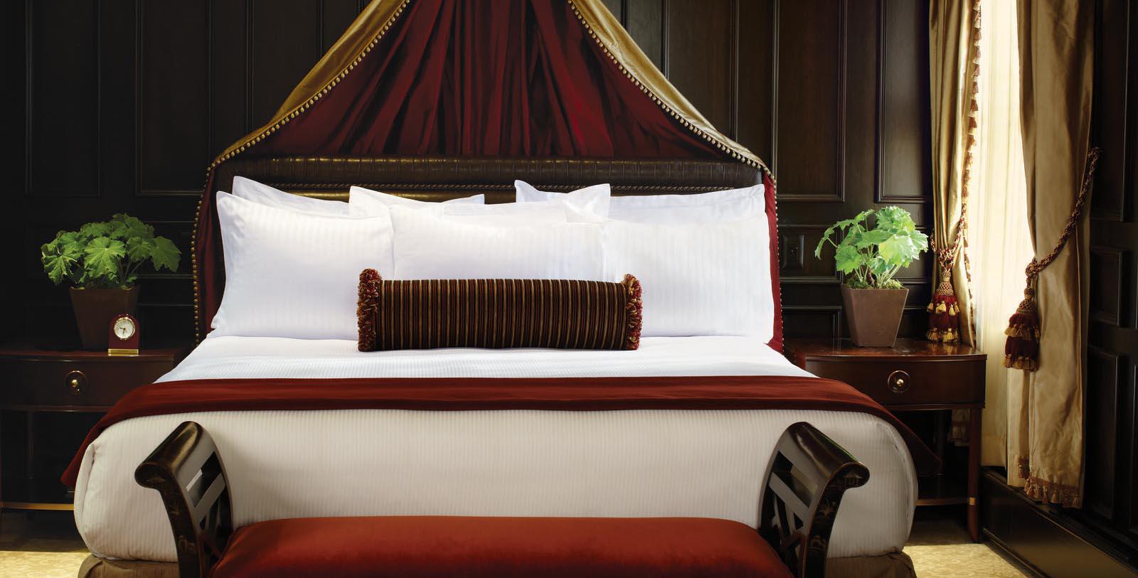 a bed with a canopy over it