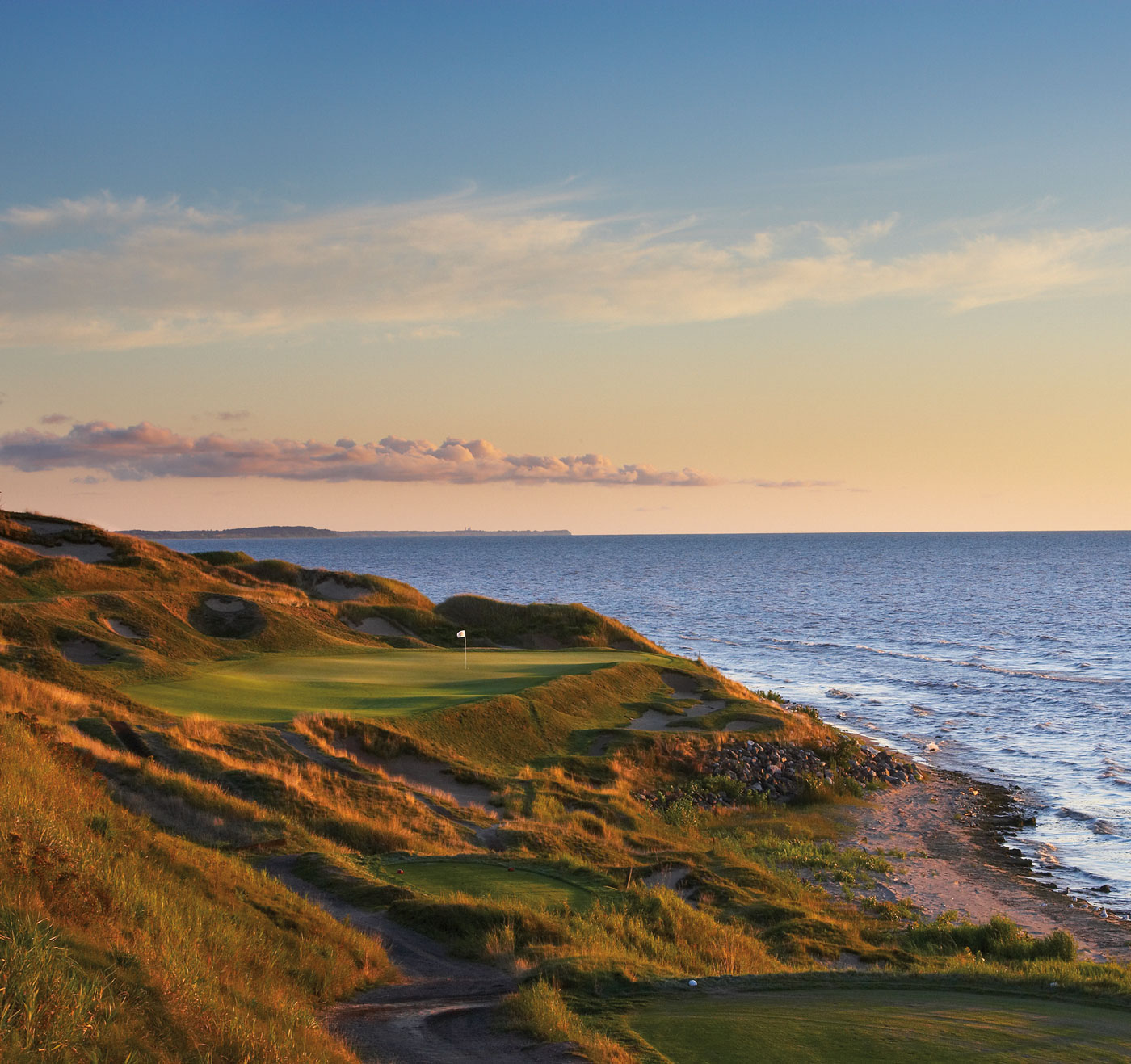 a golf course on a beach