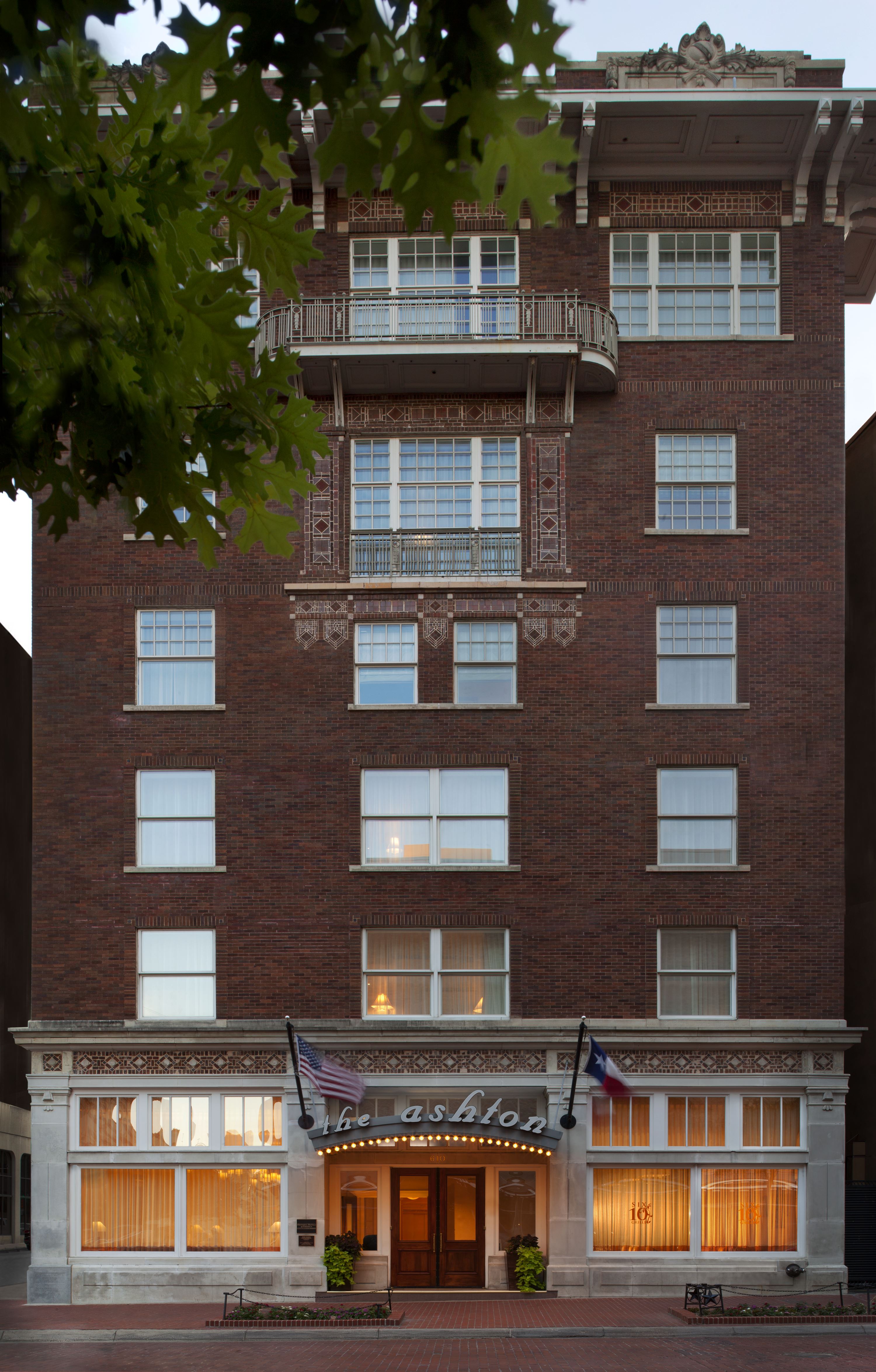 a building with flags on the front