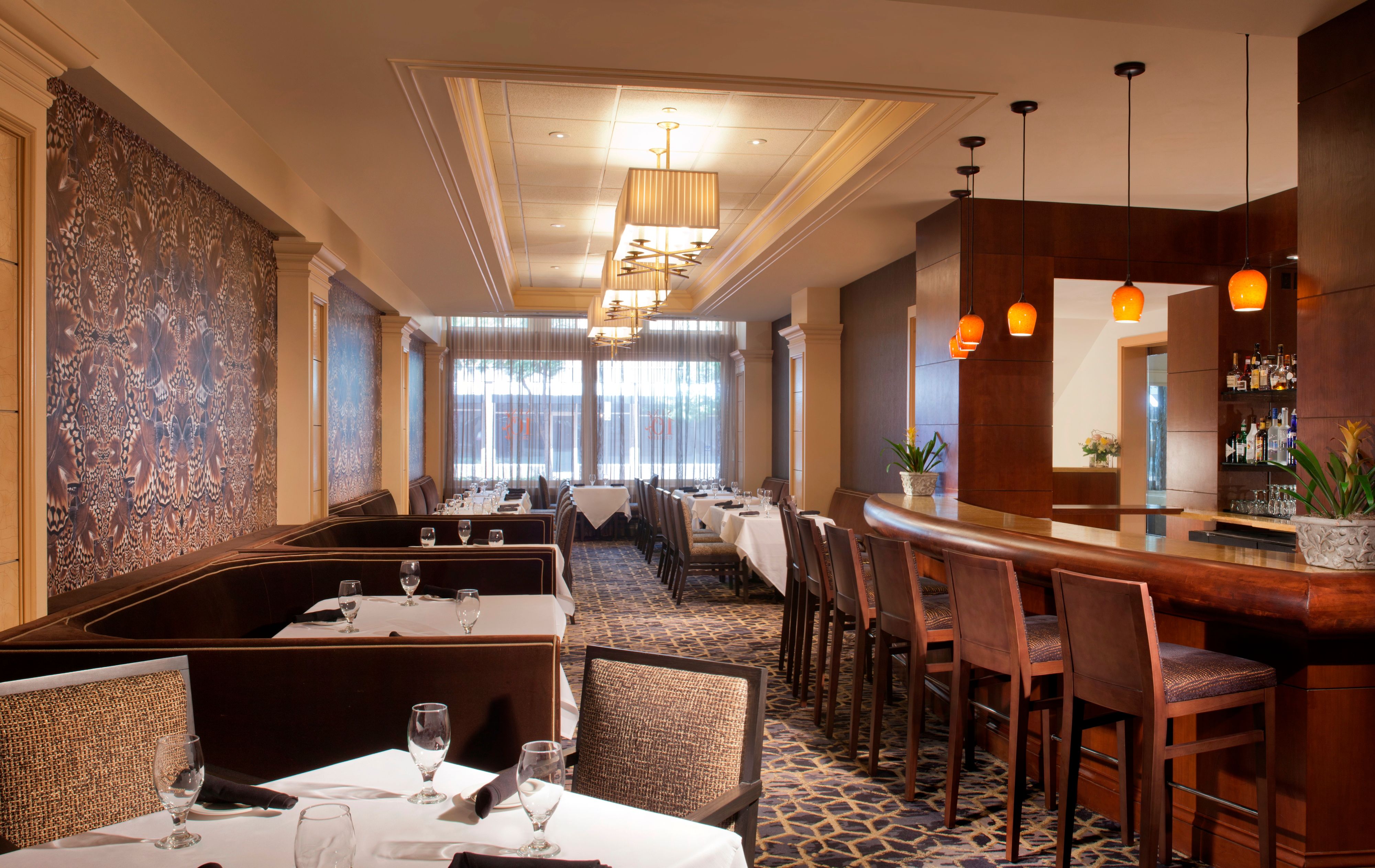 a restaurant with tables and chairs