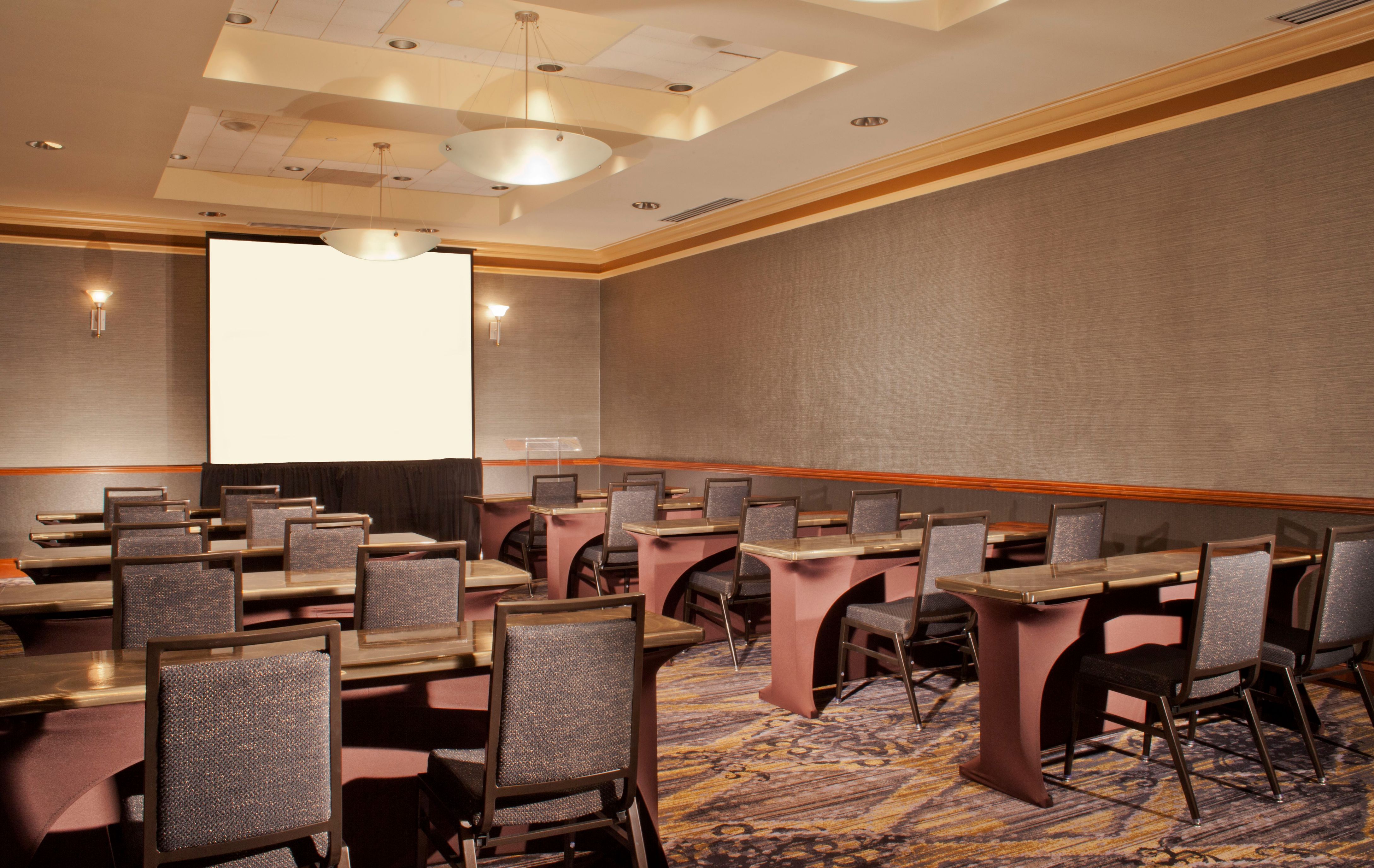 a room with tables and chairs