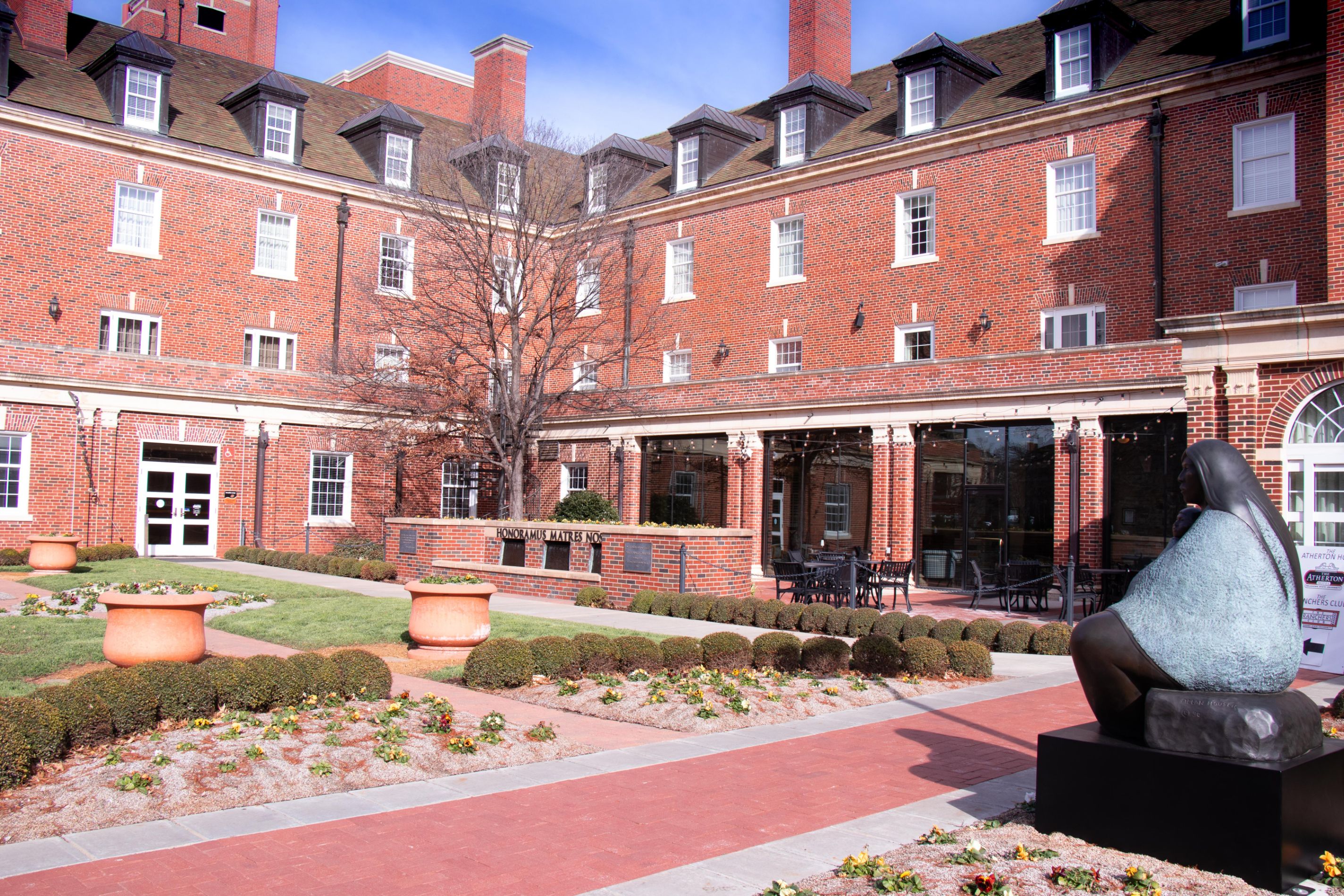 a building with a statue in front of it
