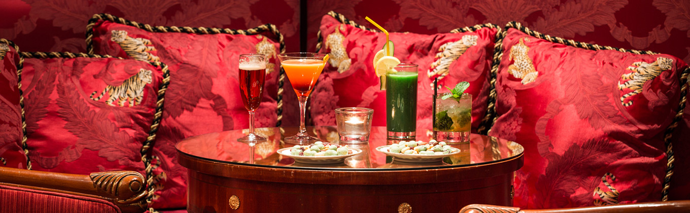 a table with drinks and snacks on it