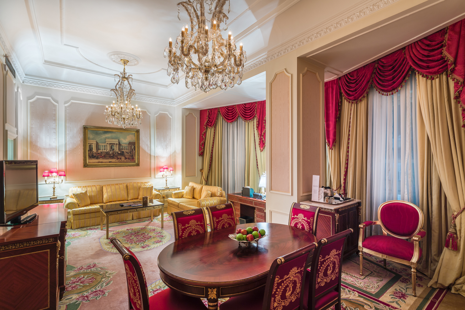 a room with a table and chairs