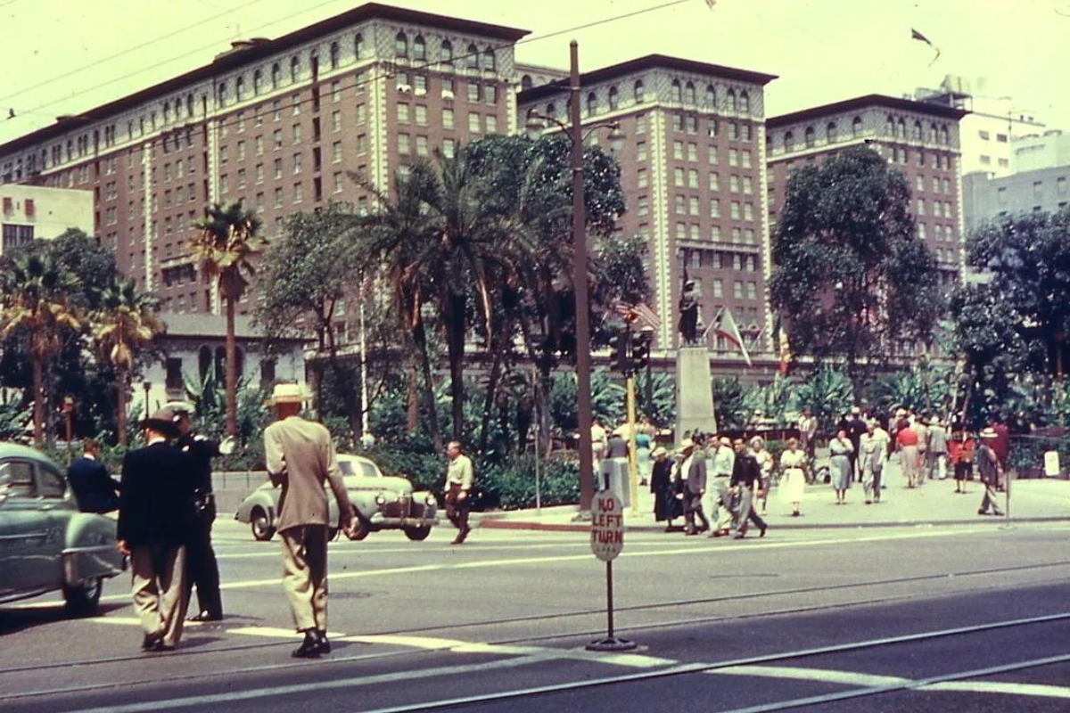 a group of people crossing a street