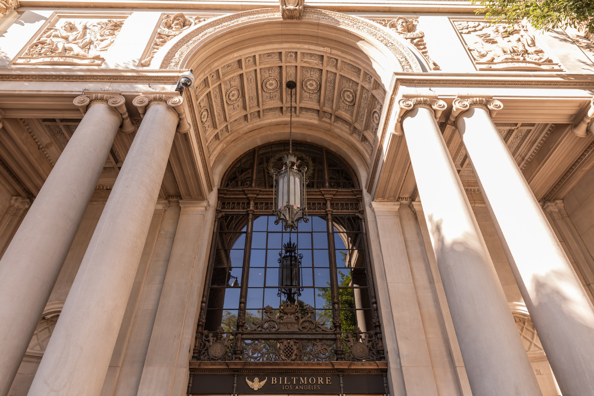 a building with columns and a lamp