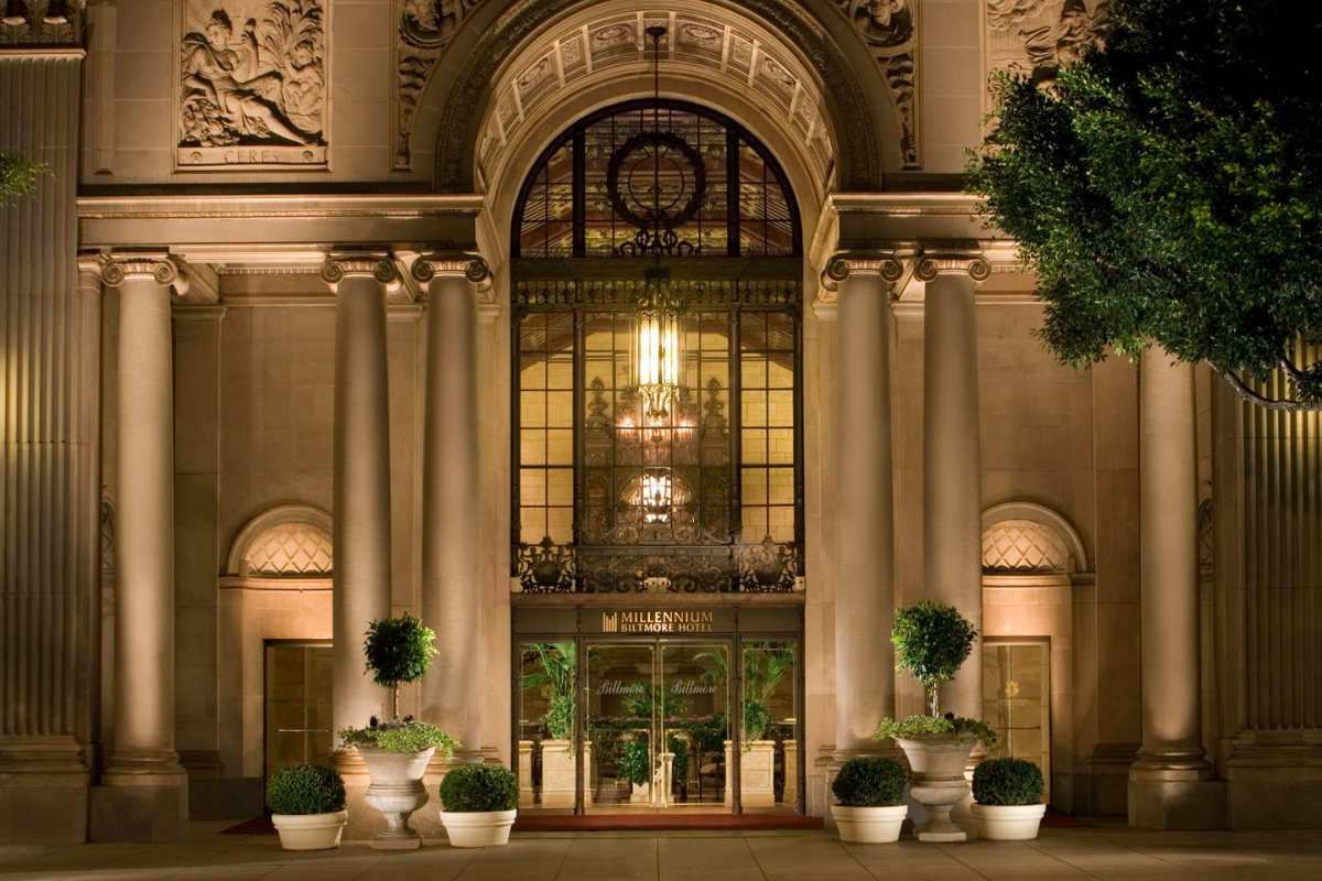 a building with columns and a chandelier
