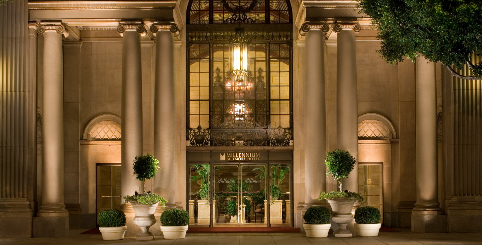 a building with columns and a chandelier
