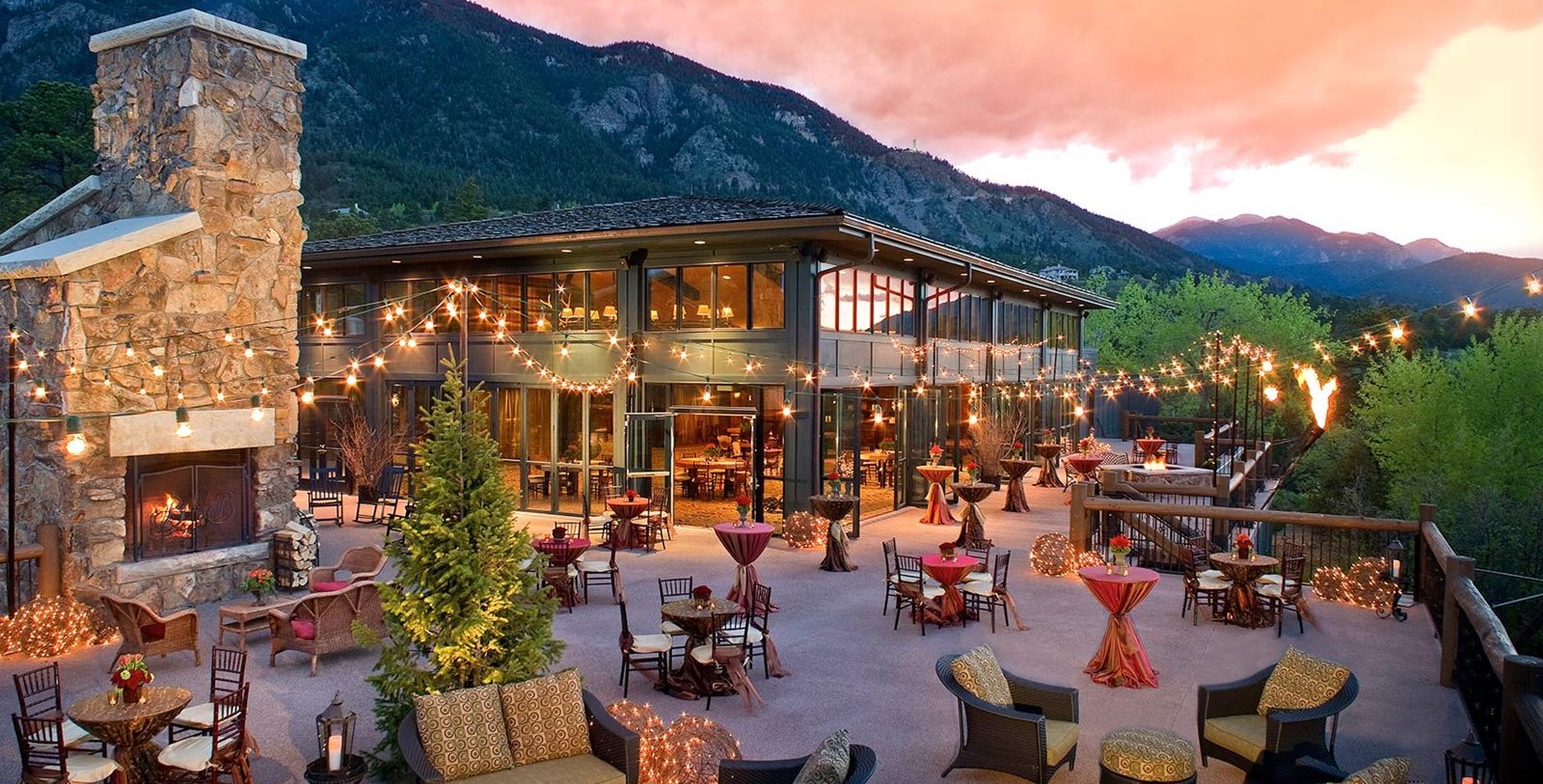 a building with tables and chairs outside
