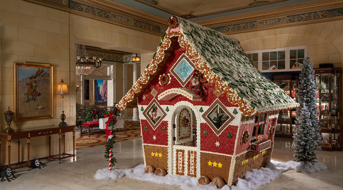 a gingerbread house in a large room