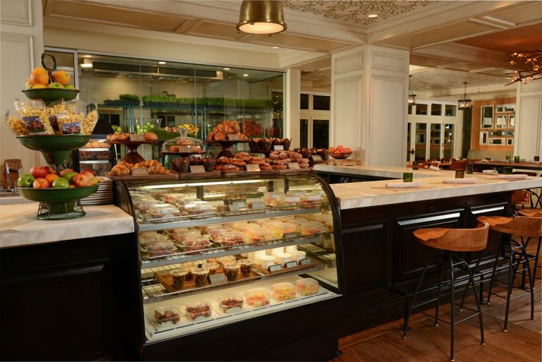 a bakery display case with food on it