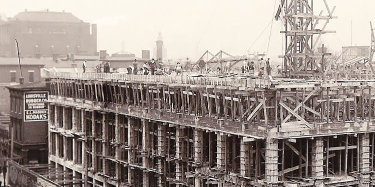 a construction site with people on the top